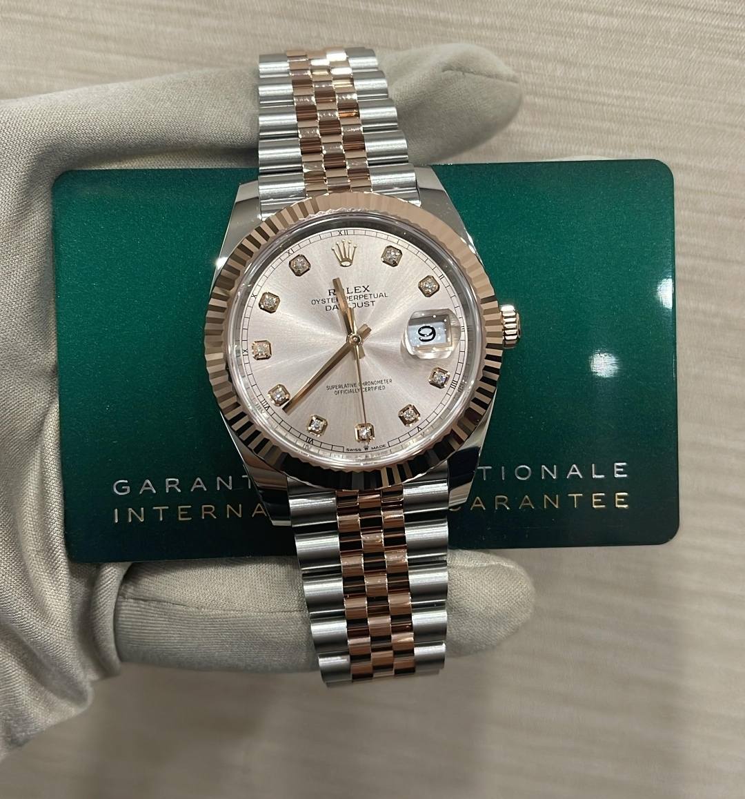 May be an image of wrist watch and text