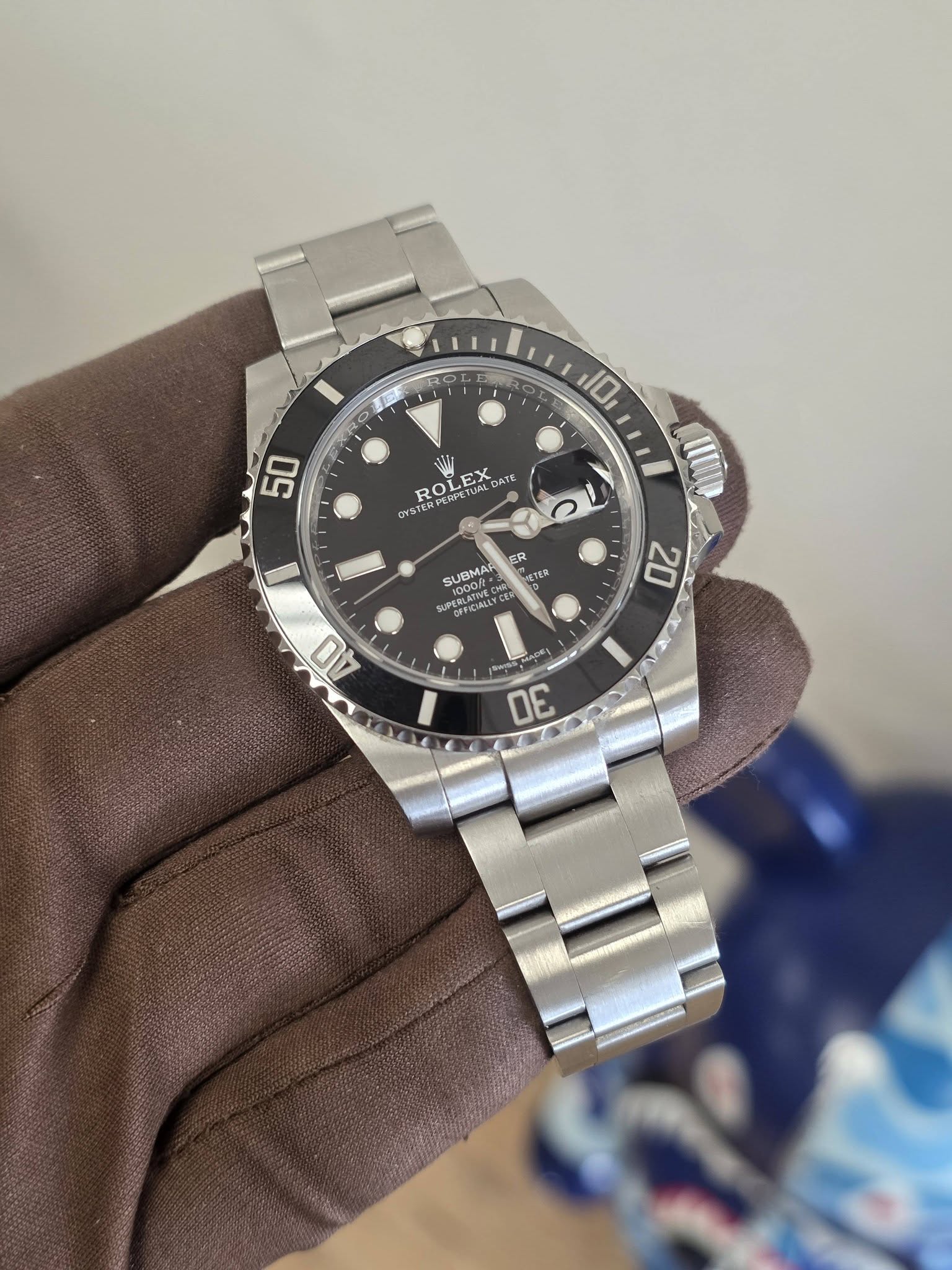 May be an image of wrist watch and text