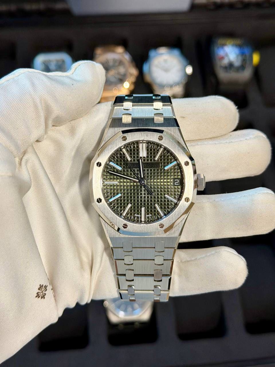 May be an image of wrist watch and text