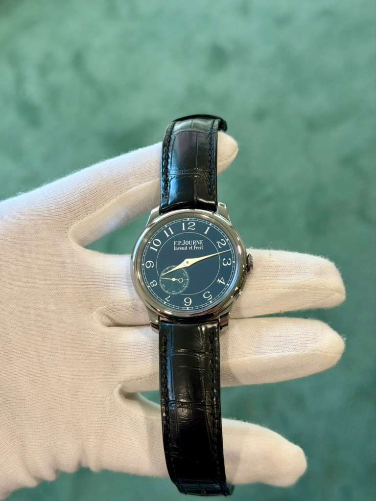 May be an image of wrist watch and text that says '12 F.P.Jo PJOURNE RNE lavenit Fecal ב 9 ω O O ဆ ٢ A 9 cr'