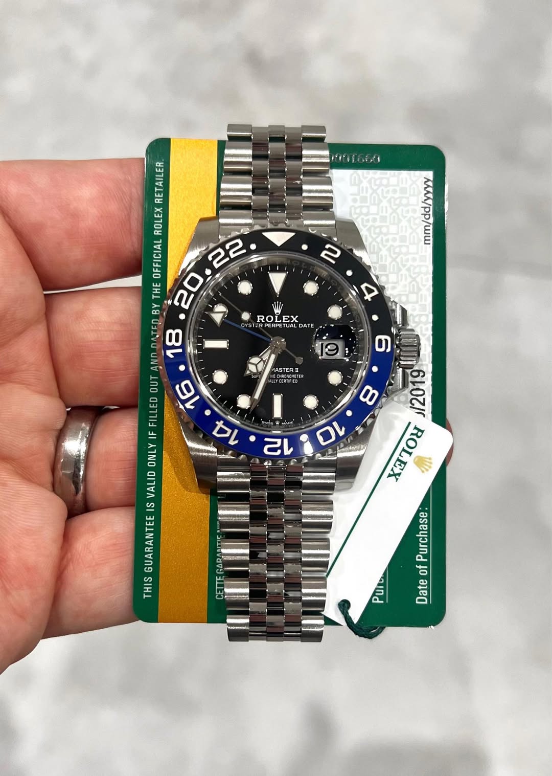 May be an image of wrist watch and text that says '2 WW ROL ROLEX EX DYS1 1ERPE ETLALD DATE TAILE RETAILER. ROLEX OFFICIAL 22 THE BY 20 AND ATED 18 OUT 16 FILLED 14 ONLY جبرا…