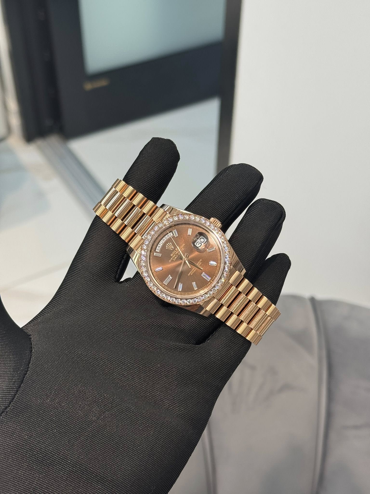 May be an image of wrist watch and text