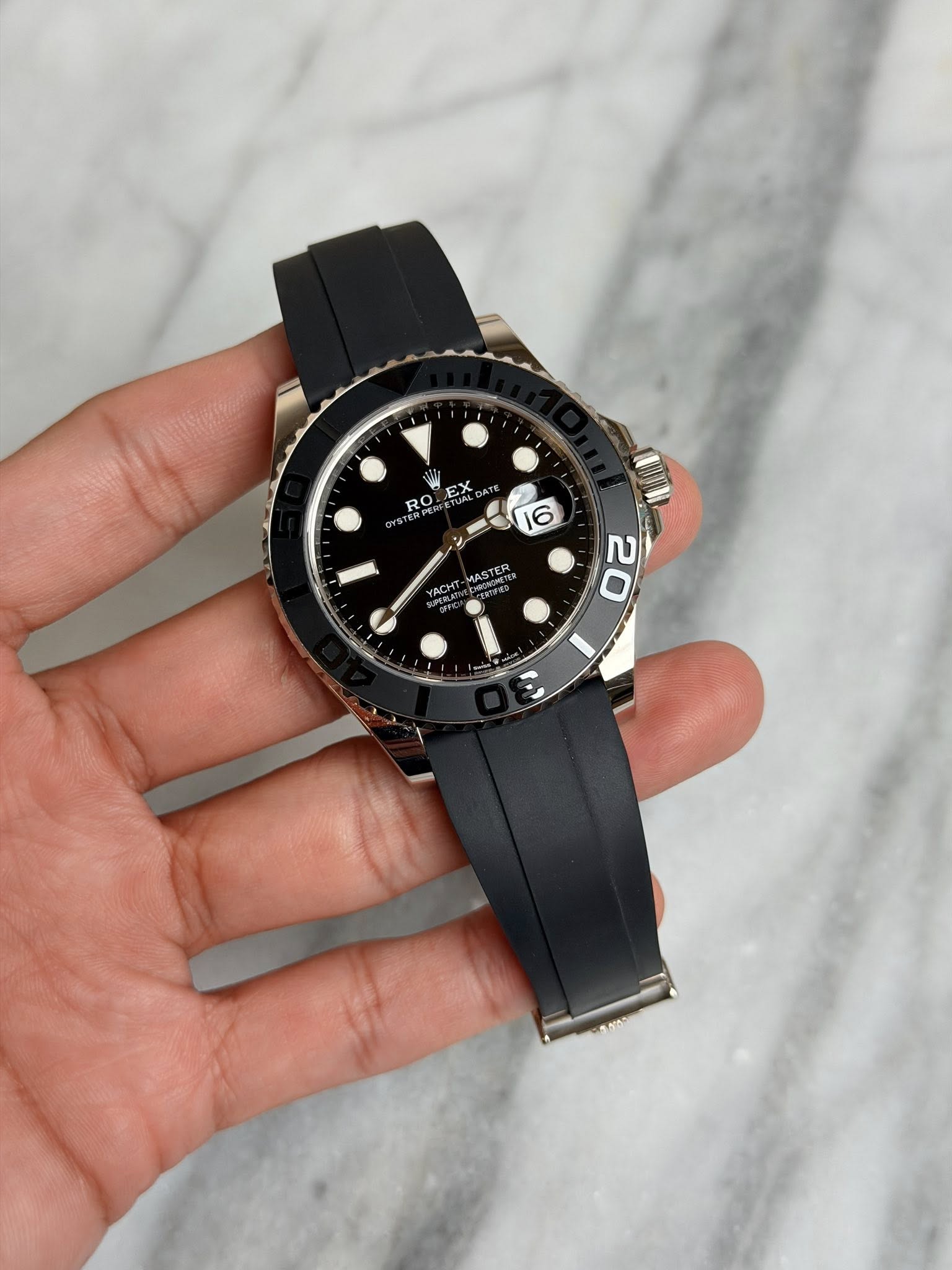 May be an image of wrist watch and text