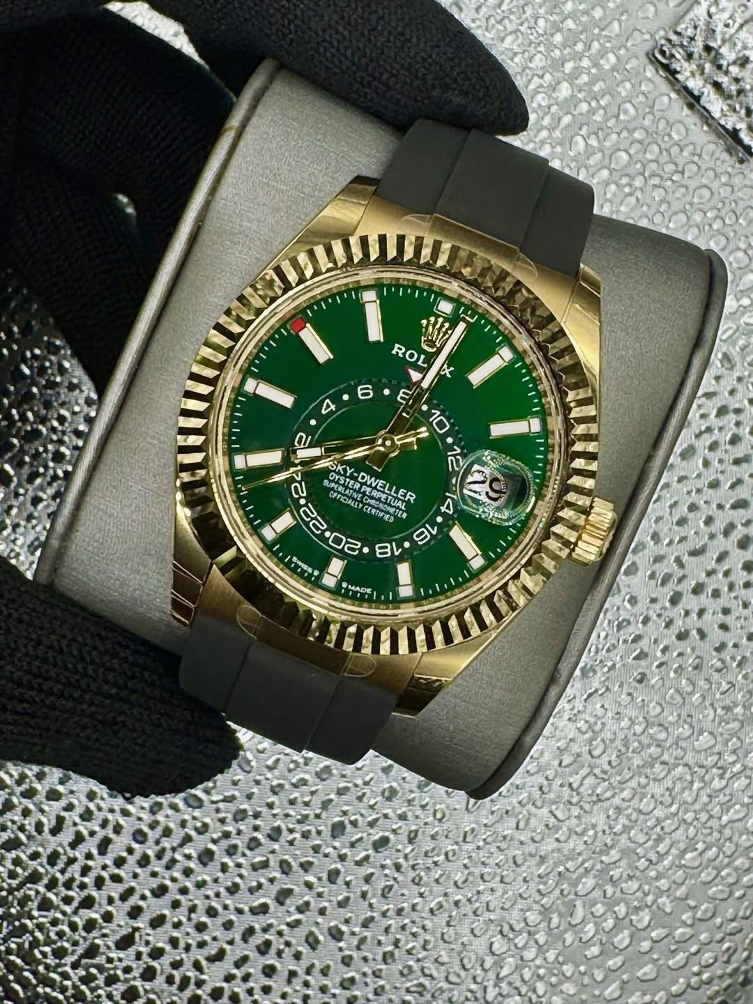 May be an image of wrist watch and text
