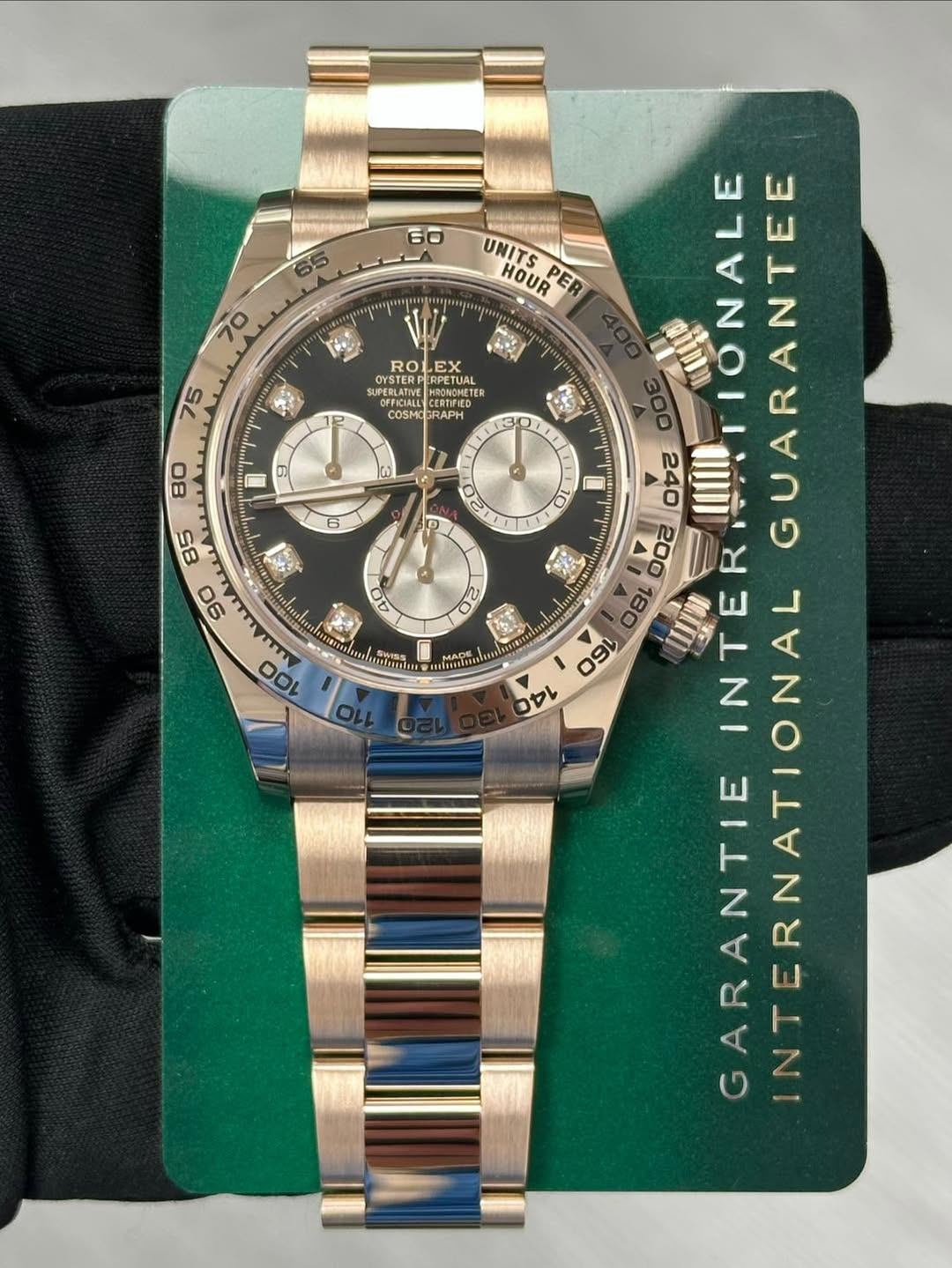 May be an image of wrist watch and text that says '60 UNITS HOUR PER 70 RO EX CYSTERE STENH SRPETNNER CERTIFED COSMOE COSMOGRAPH 空 75 መርምስ e D 10 AO 海 100 TIONALE GUARANTE 0b2…