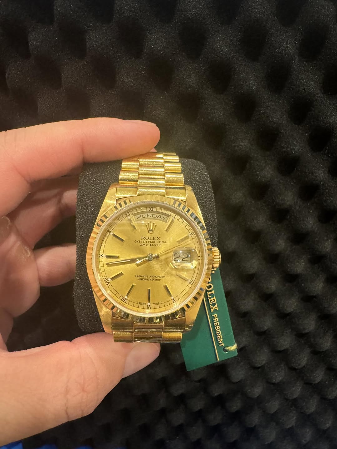 May be an image of wrist watch and text