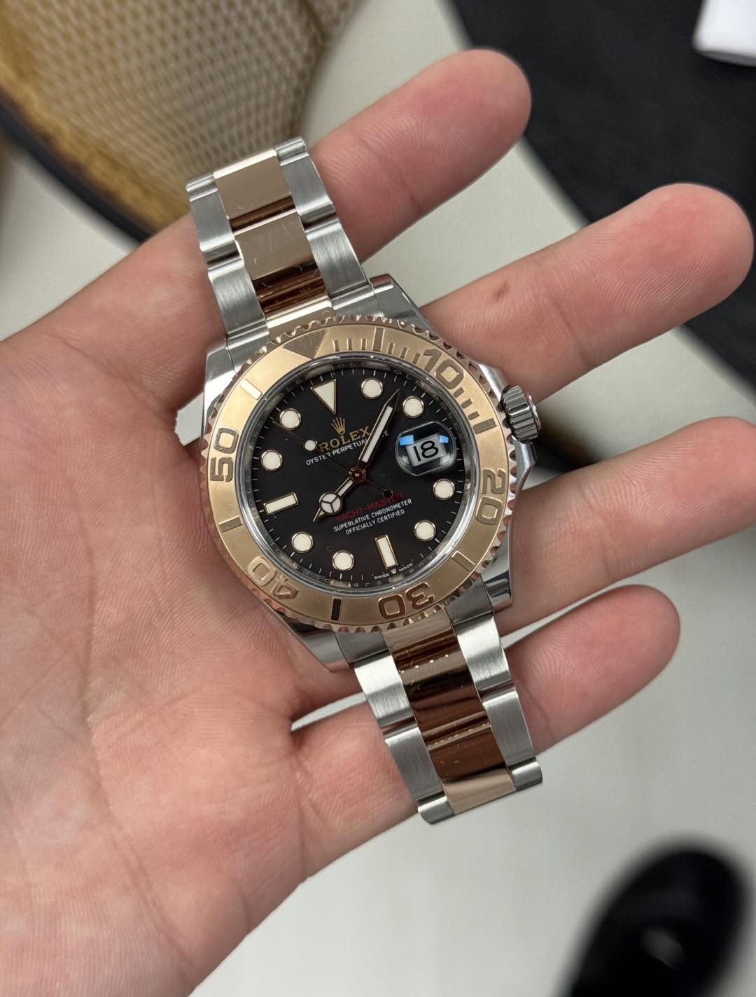 May be an image of wrist watch and text