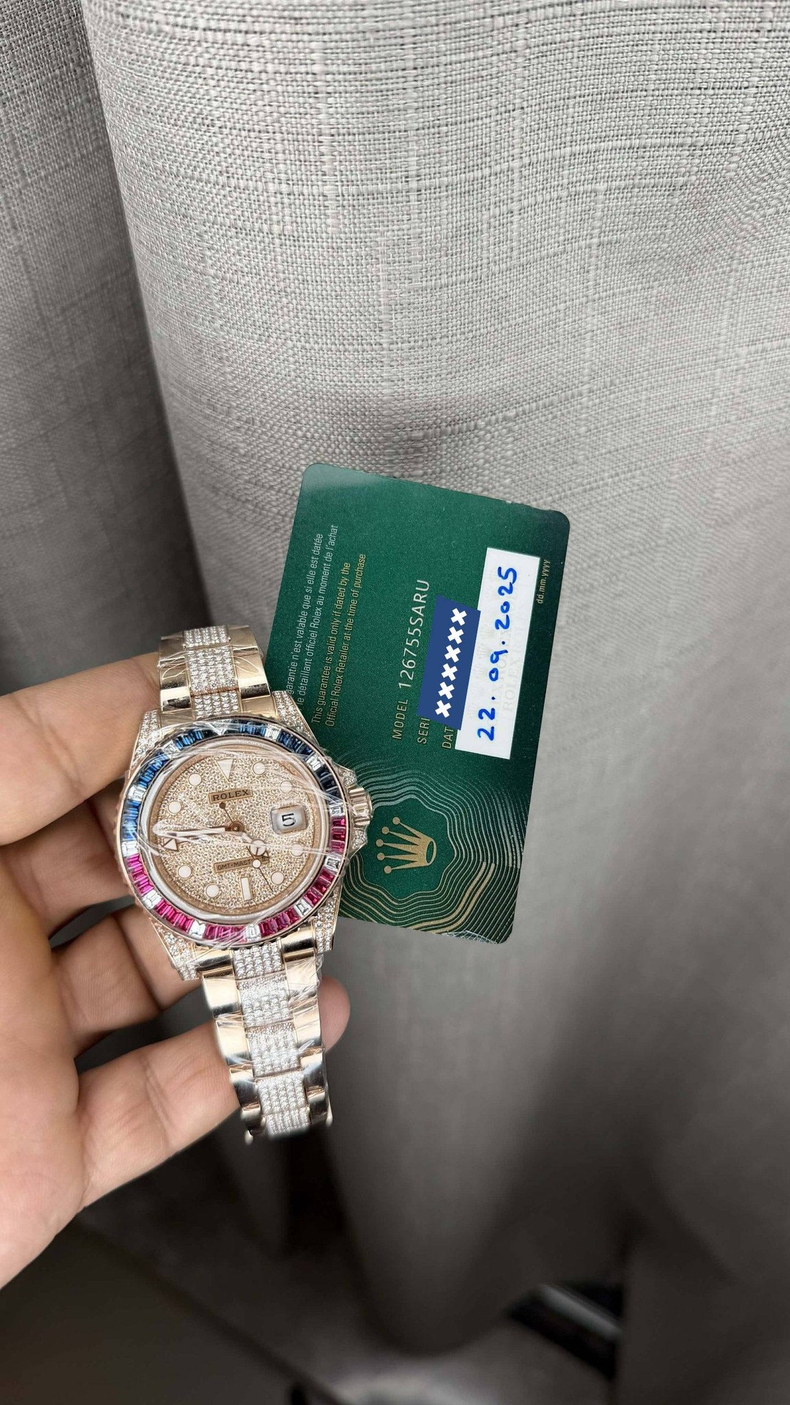 May be an image of wrist watch, money and text that says 'በኑጀል IEENpTU Eicias 26755SARU xxxxxx MSDEL 2 T 5 រ A קר'