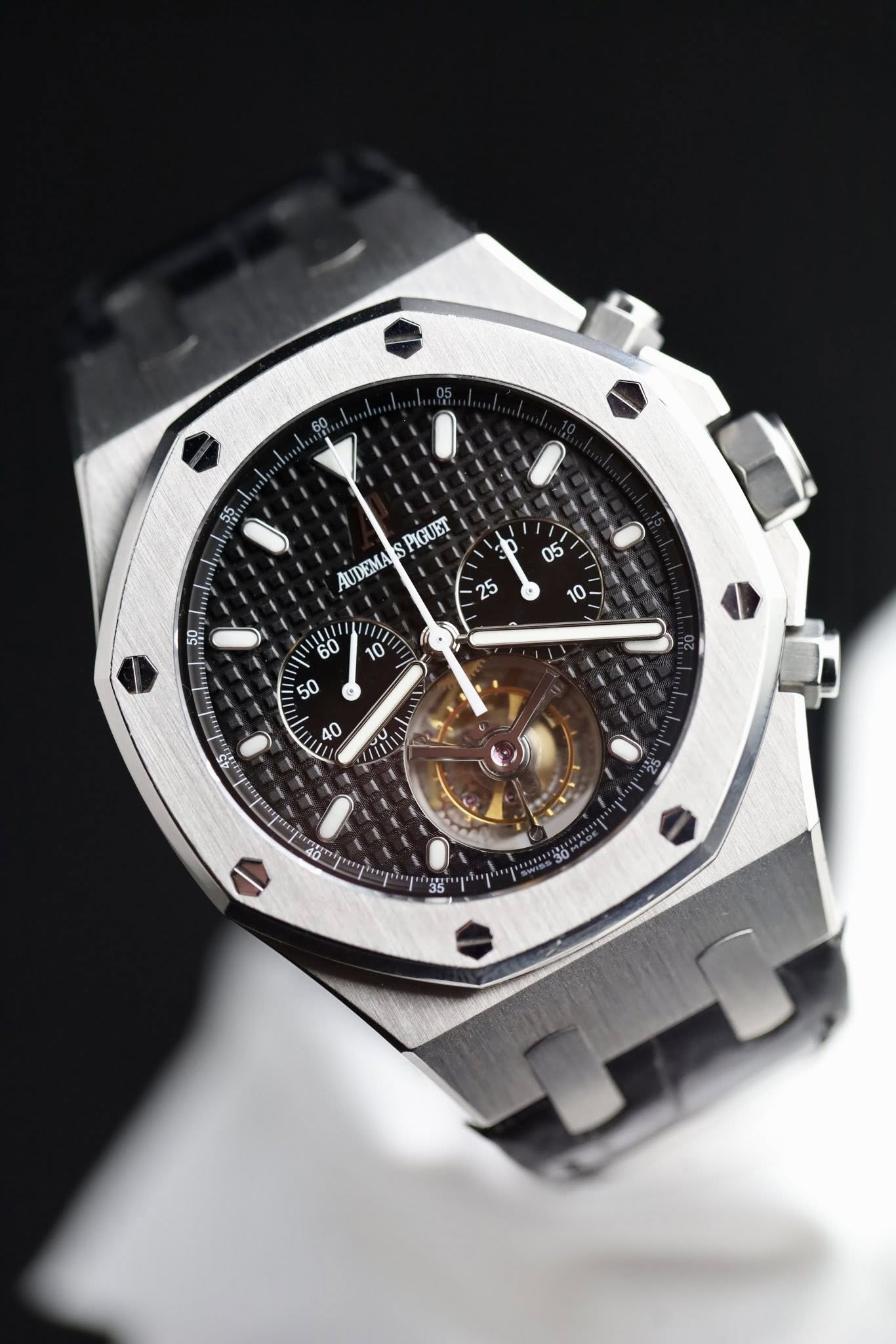 May be an image of wrist watch and text