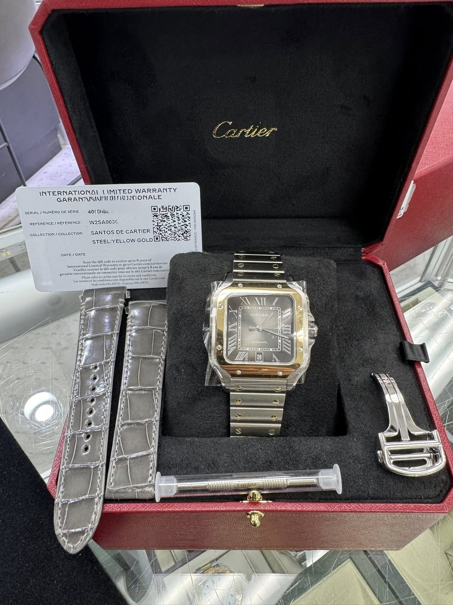 May be an image of wrist watch and text