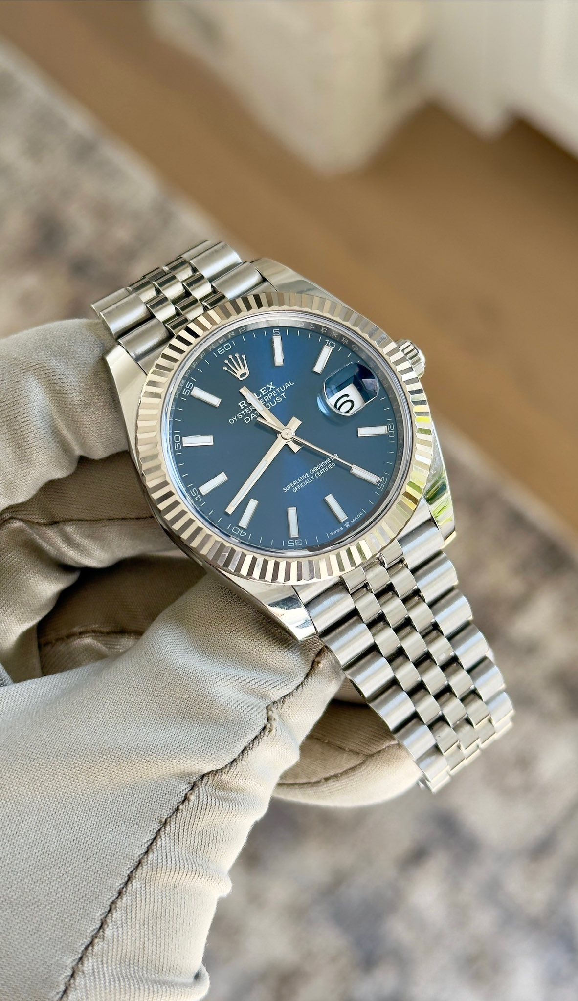 May be an image of wrist watch and text