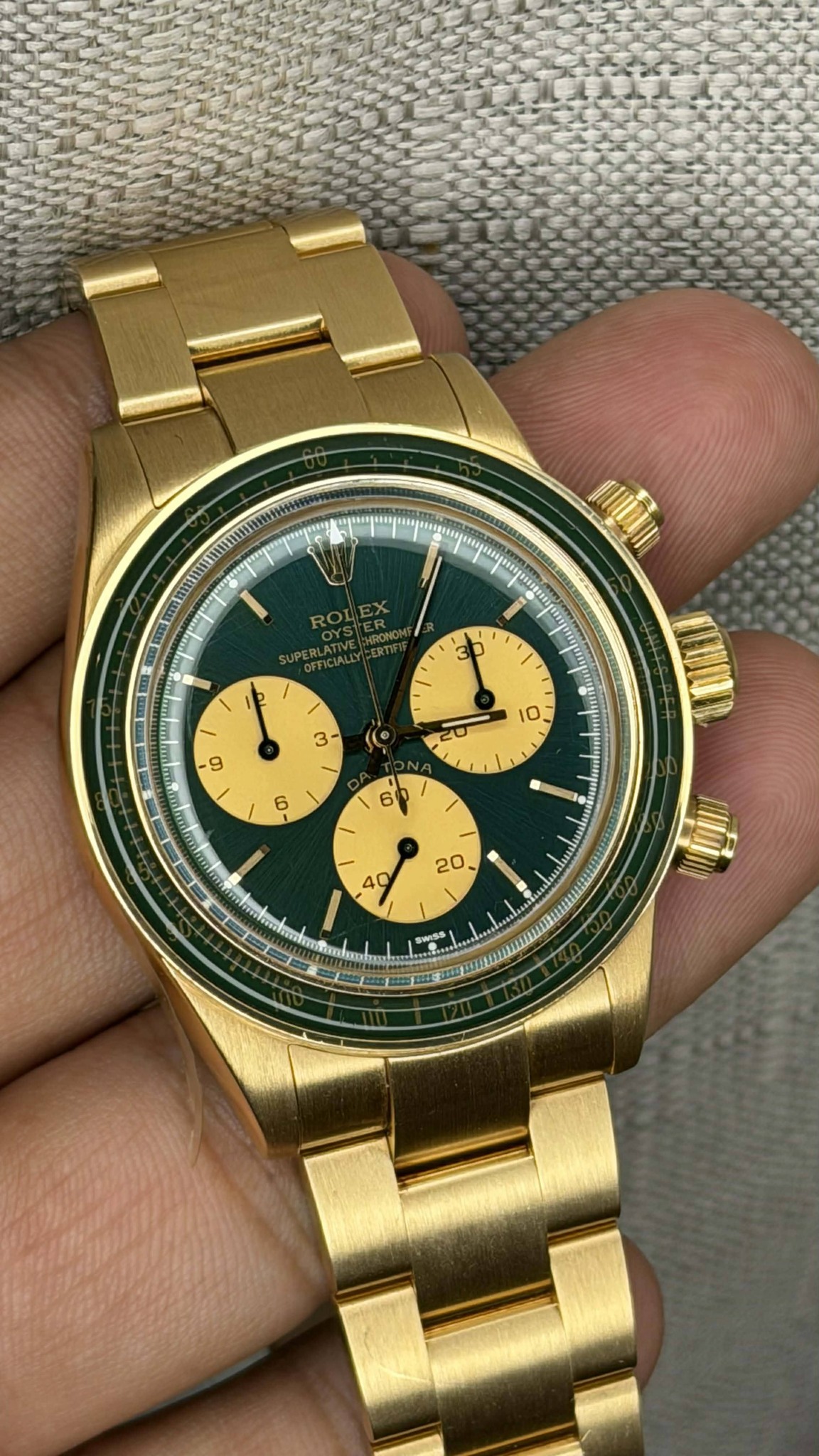 May be an image of wrist watch and text