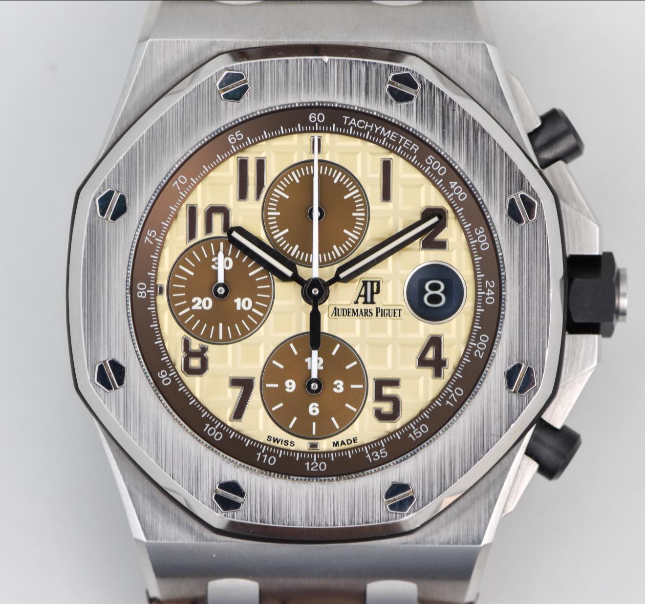 May be an image of wrist watch and text
