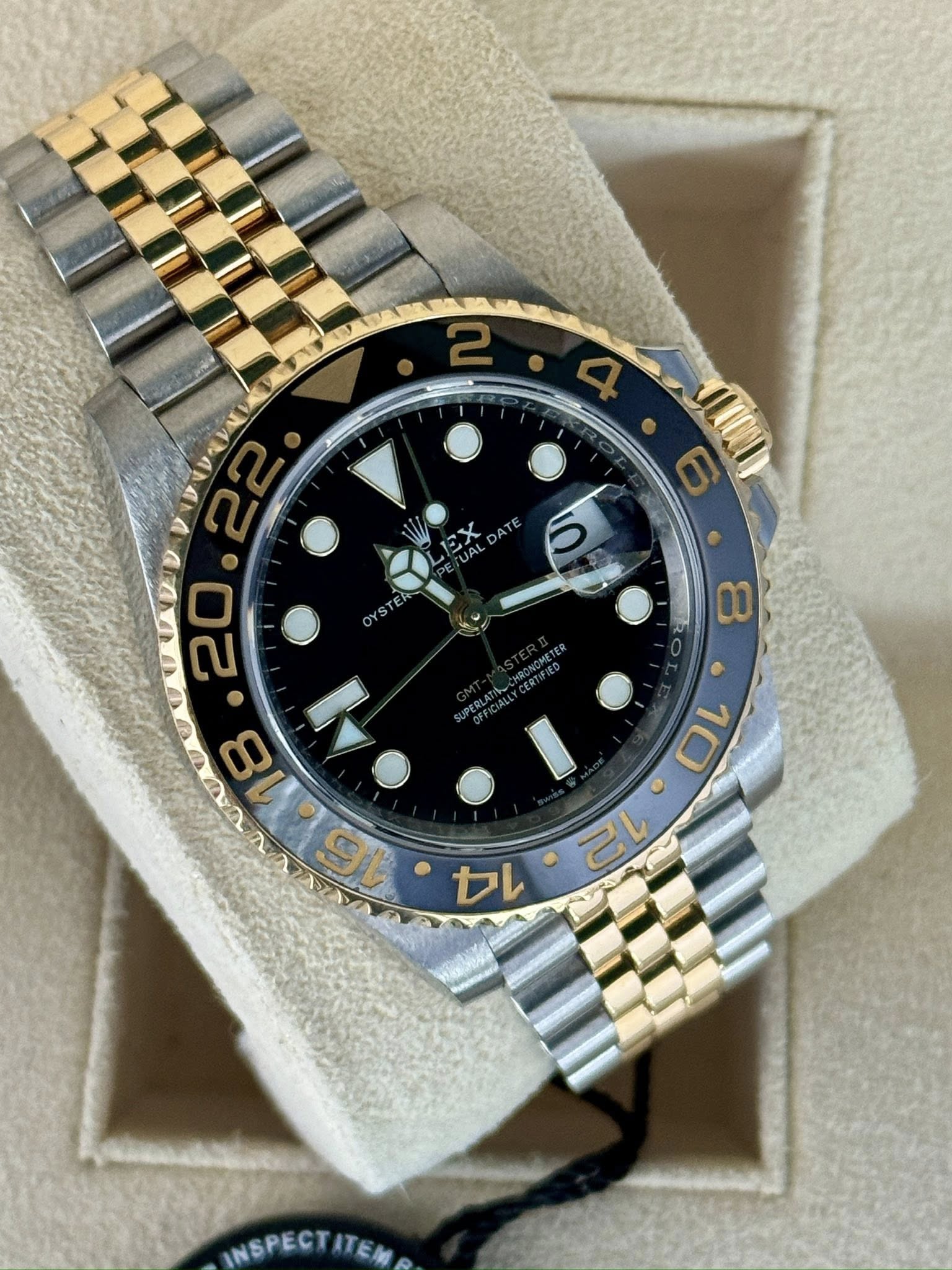 May be an image of wrist watch and text