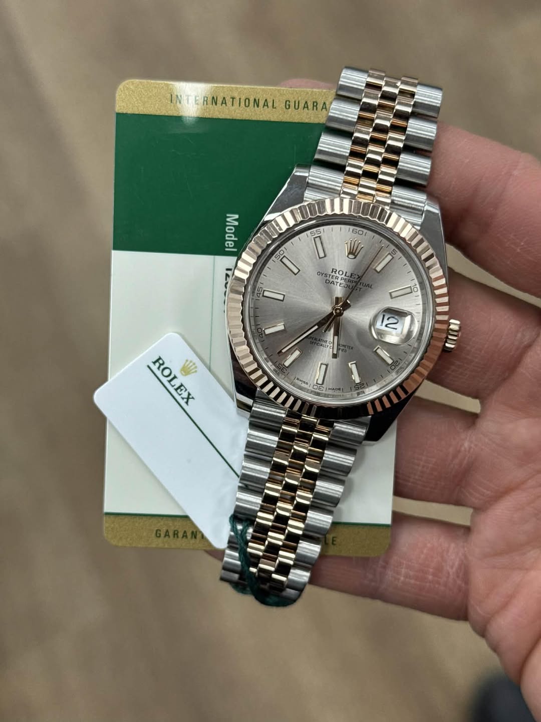 May be an image of wrist watch and text that says 'INTERNATIONAL GUARA or Mπάι Model フ 601 50 SS S5 5 50 l' GYST YETROL ROL RE STERPE DATE 12 ROLEX Vth .. အ I F 月'