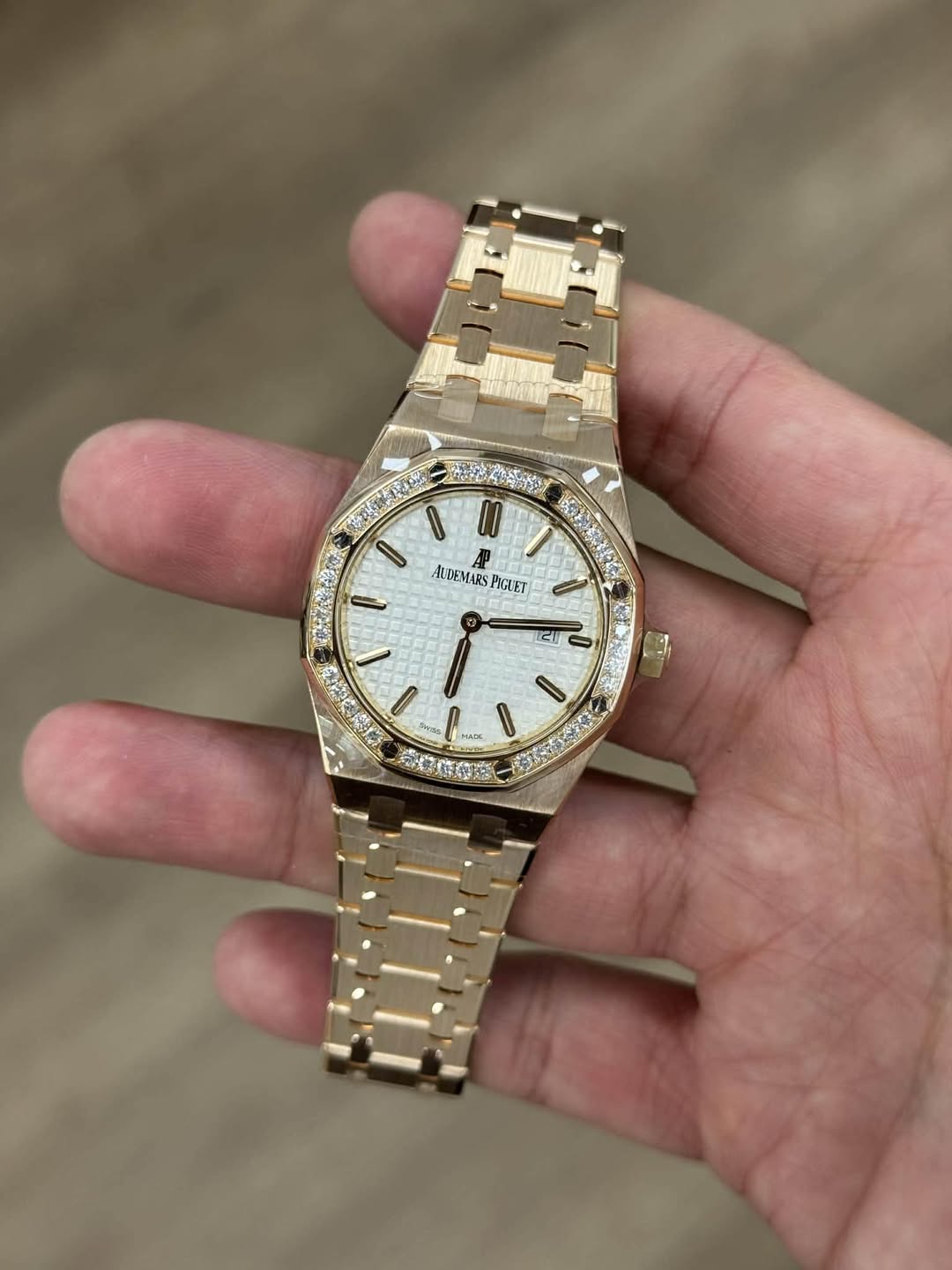 May be an image of wrist watch and text