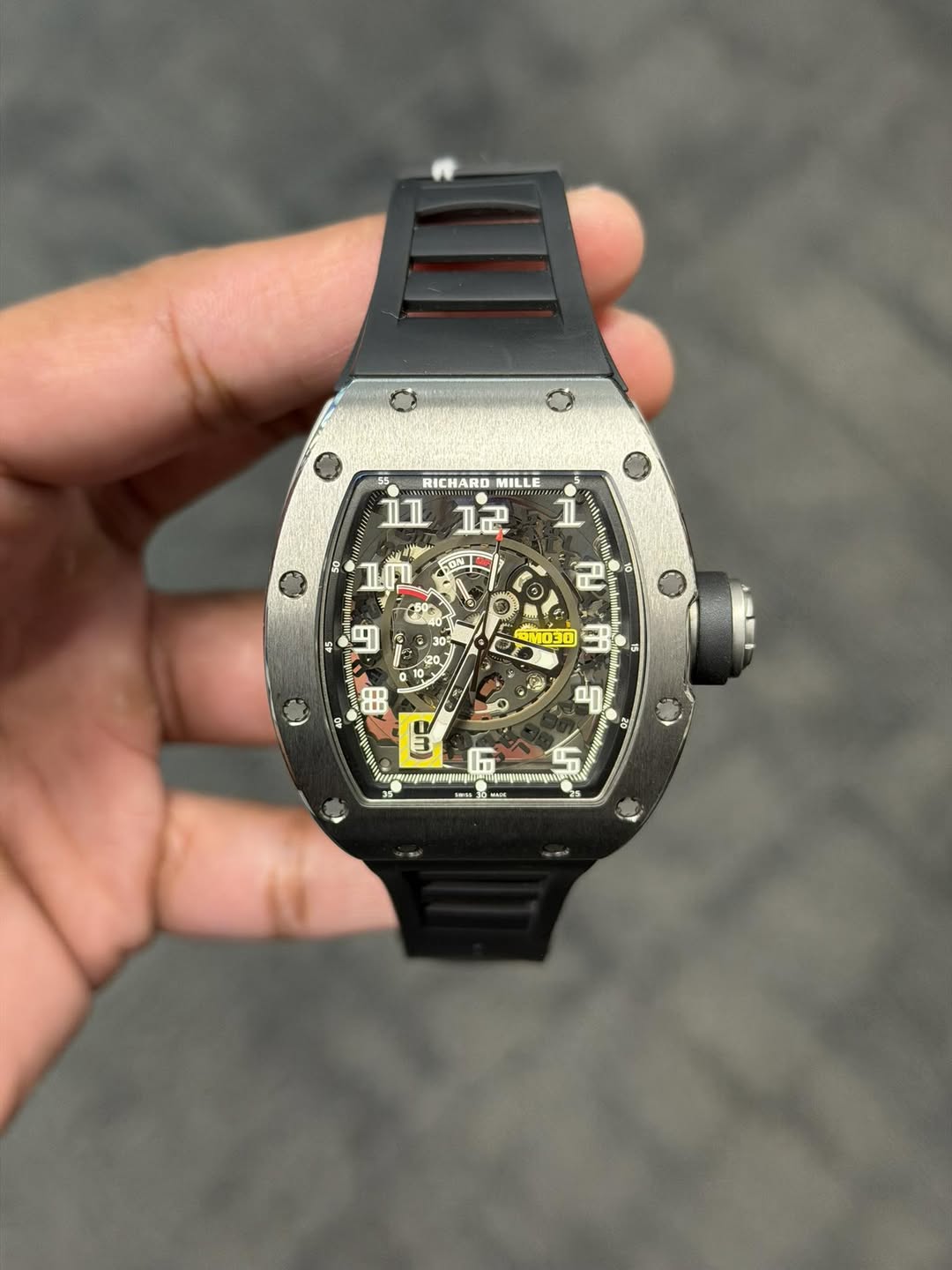 May be an image of wrist watch and text