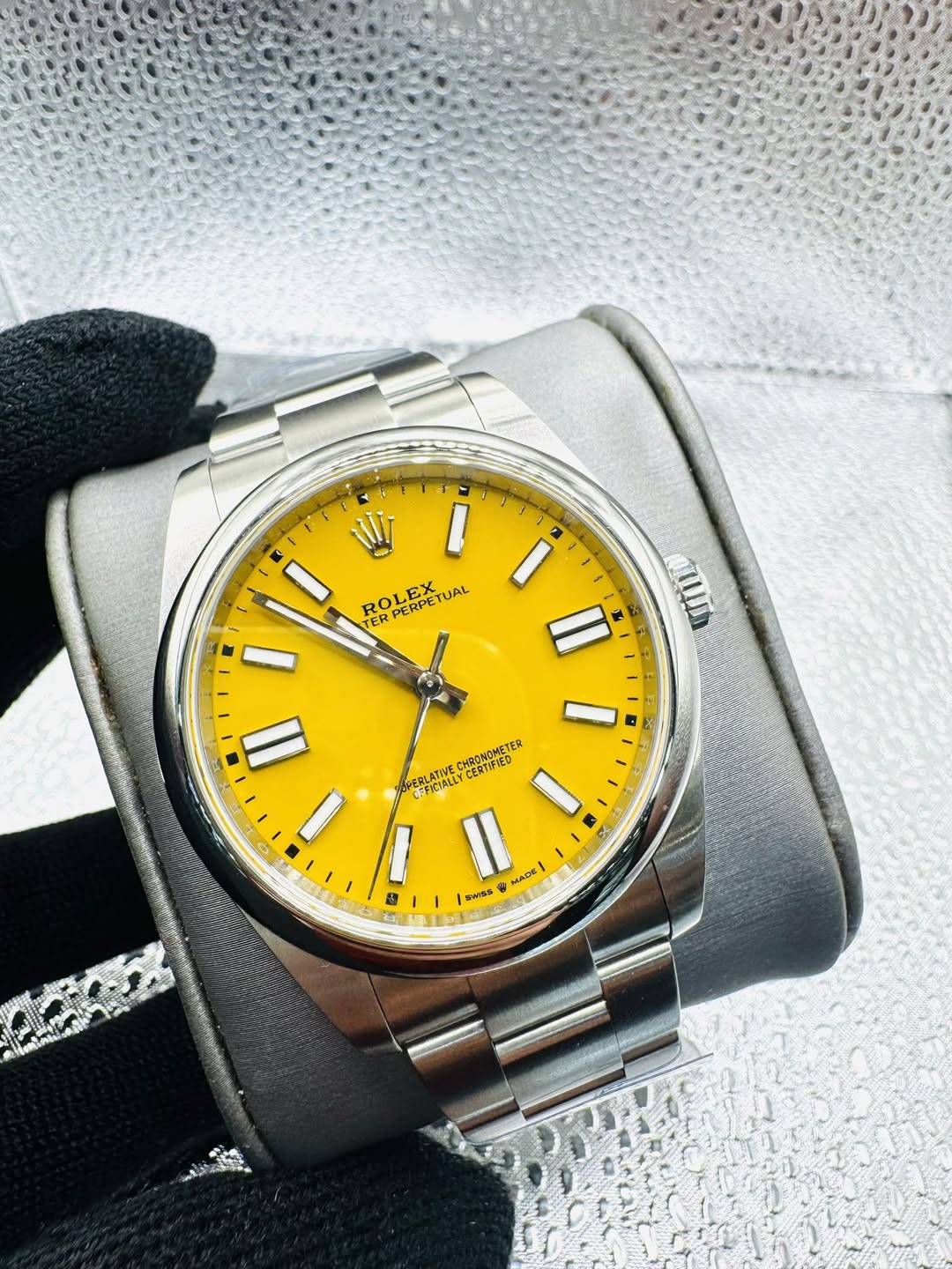 May be an image of wrist watch and text