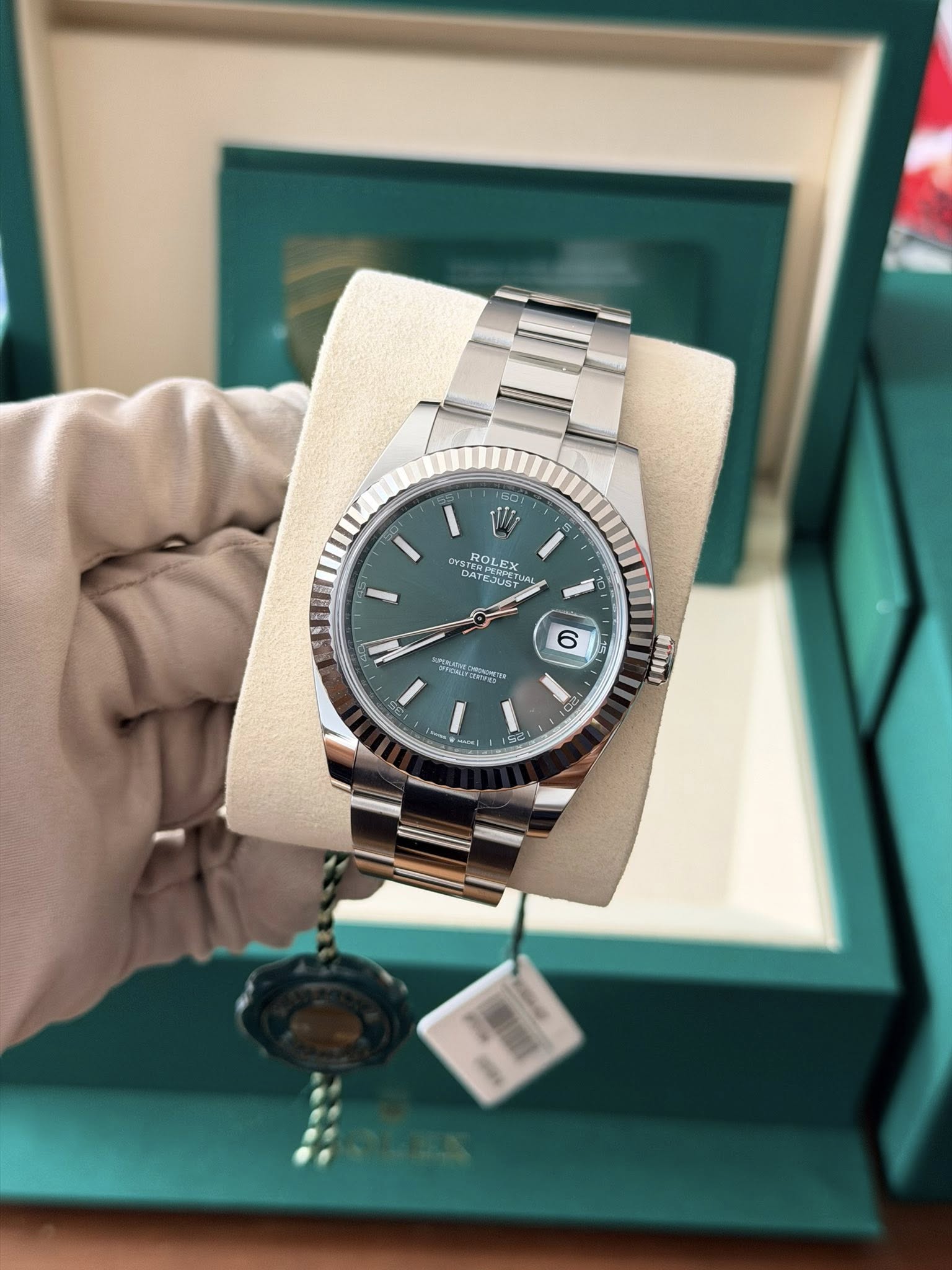 May be an image of wrist watch and text