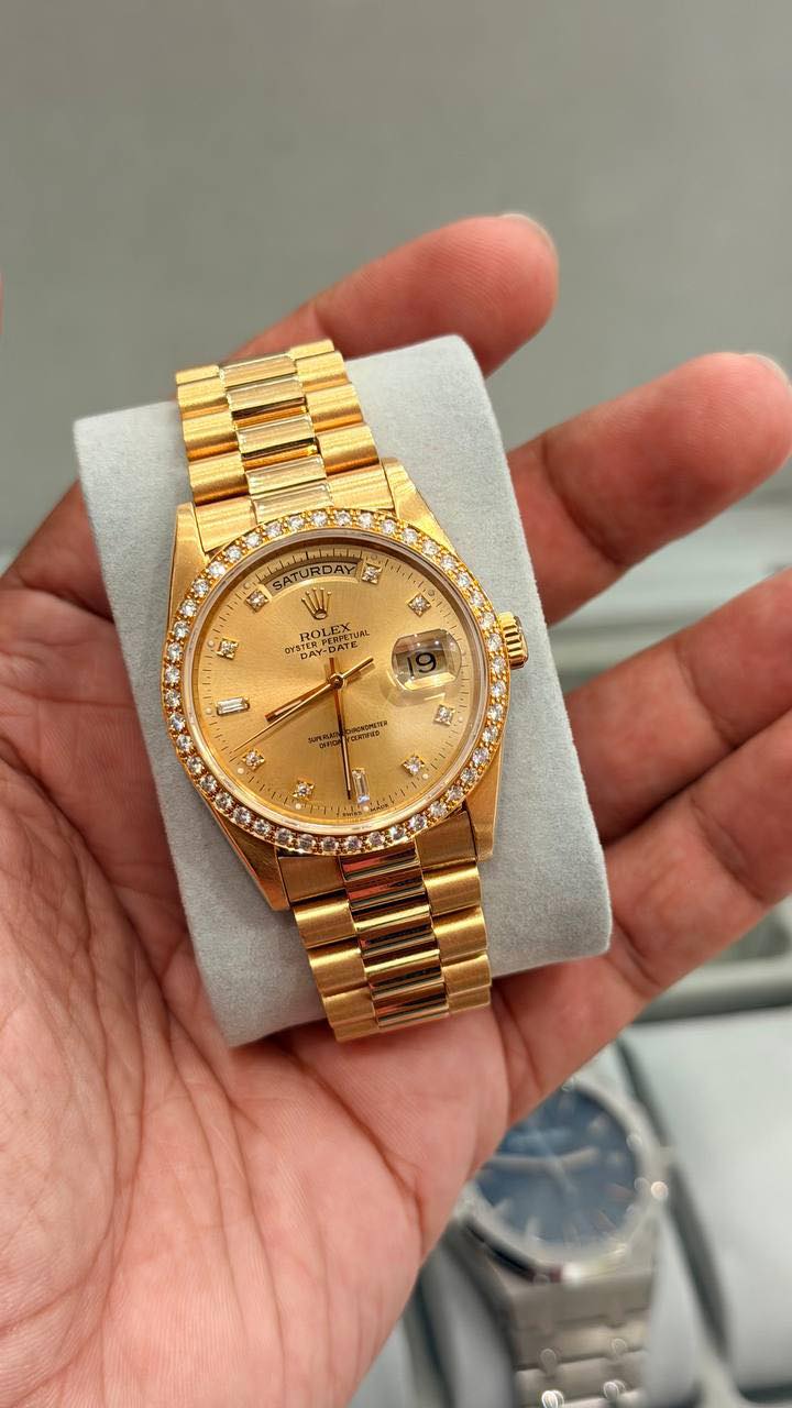 May be an image of wrist watch and text