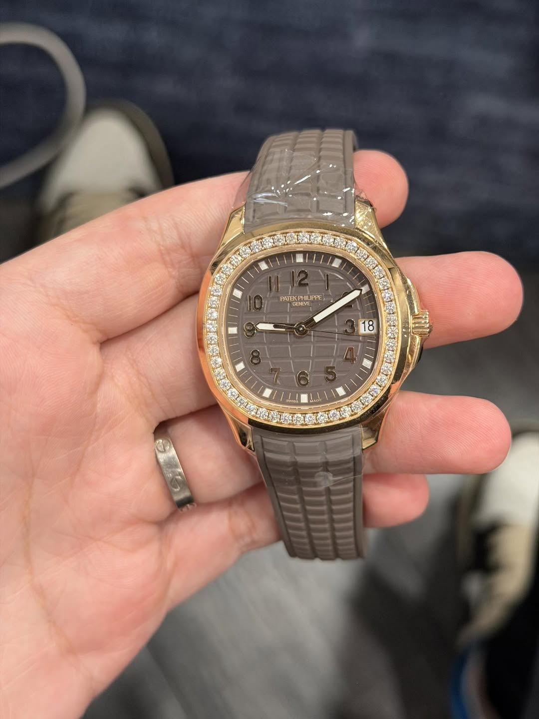May be an image of wrist watch and text
