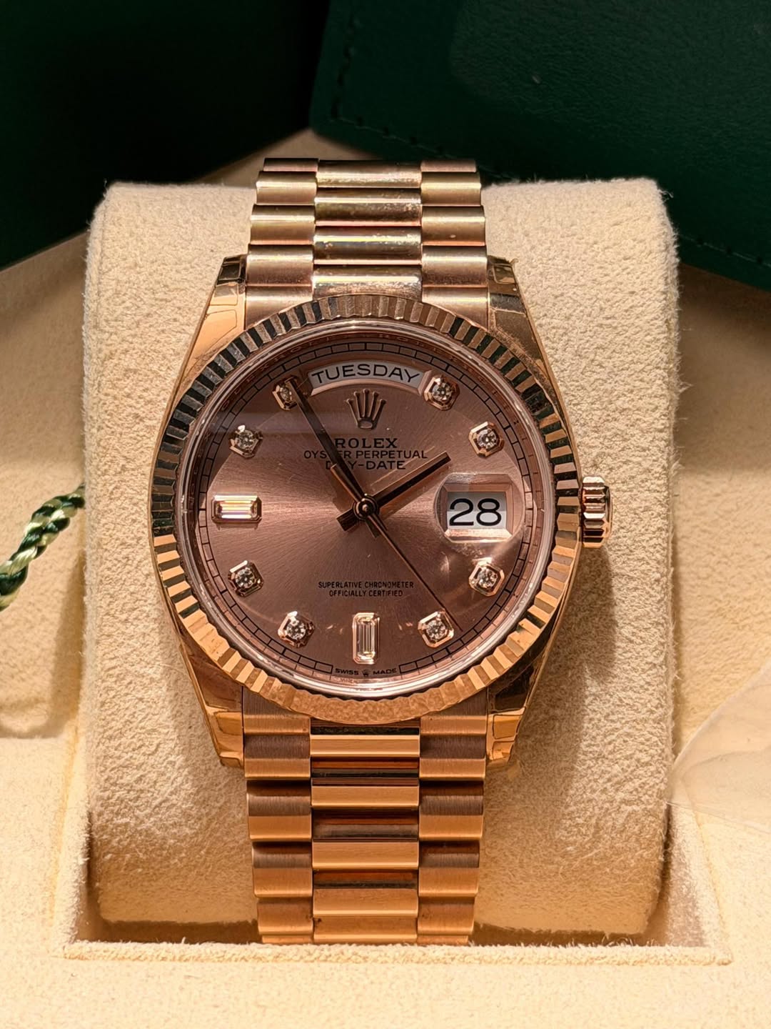 May be an image of wrist watch and text