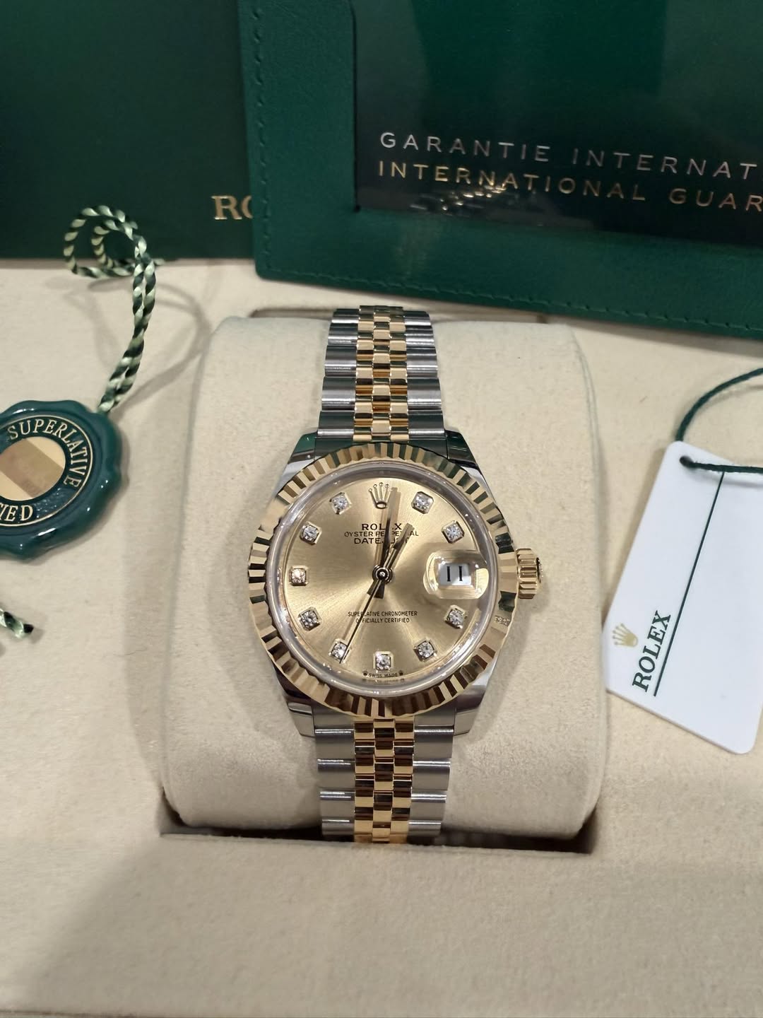 May be an image of wrist watch and text