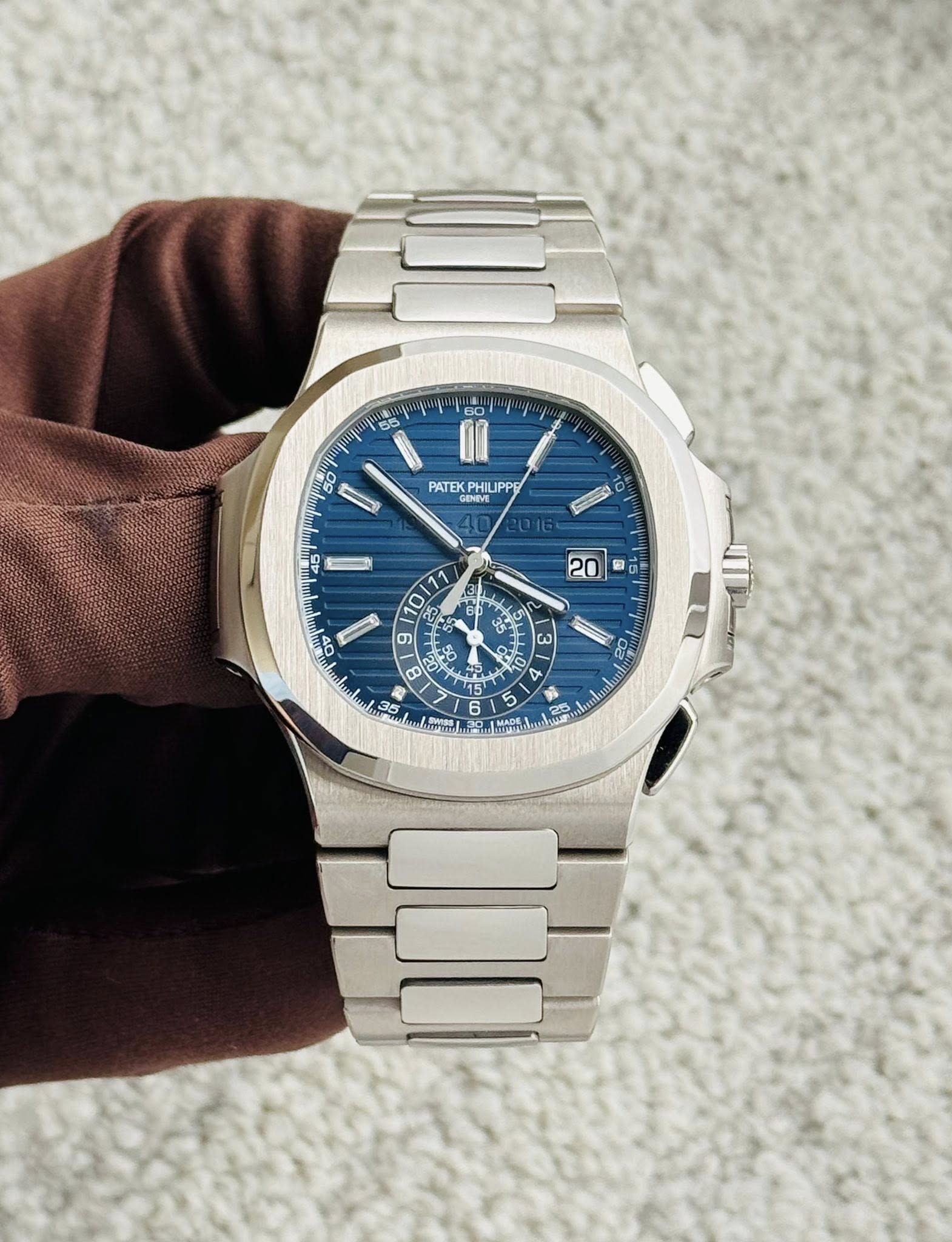 May be an image of wrist watch and text that says '60 පිජි 비비 I PATEKP LiPPS ENIVE 10 B도 እም ። 9 02 هه LS 6 ผ ot 0 لنام ん ምደ 4 & 6 5 T 6 S 安 SANO 35 35 4'