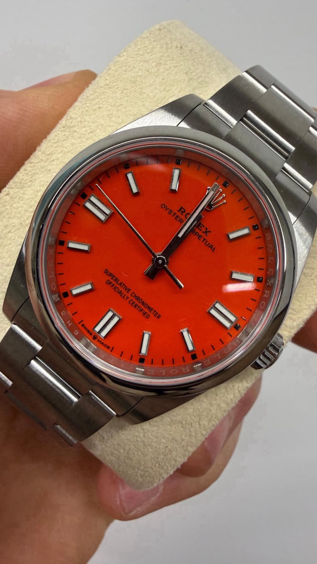 May be an image of wrist watch and text