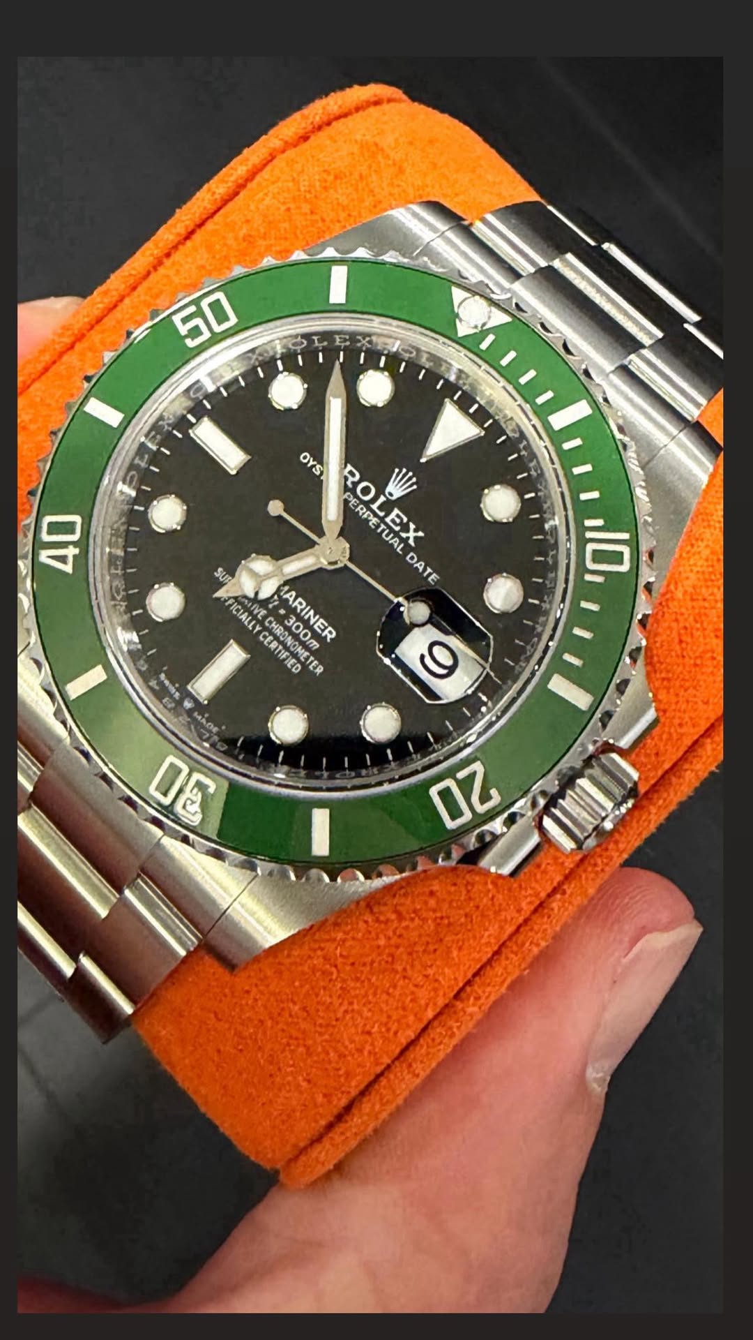 May be an image of wrist watch and text