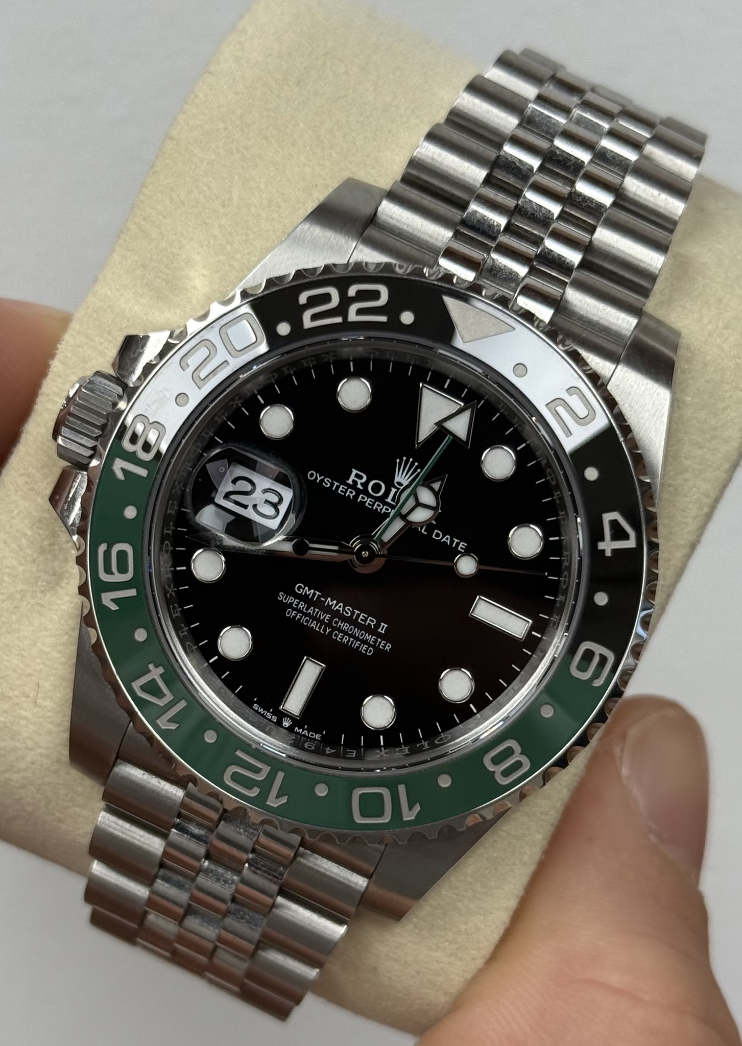 May be an image of wrist watch and text