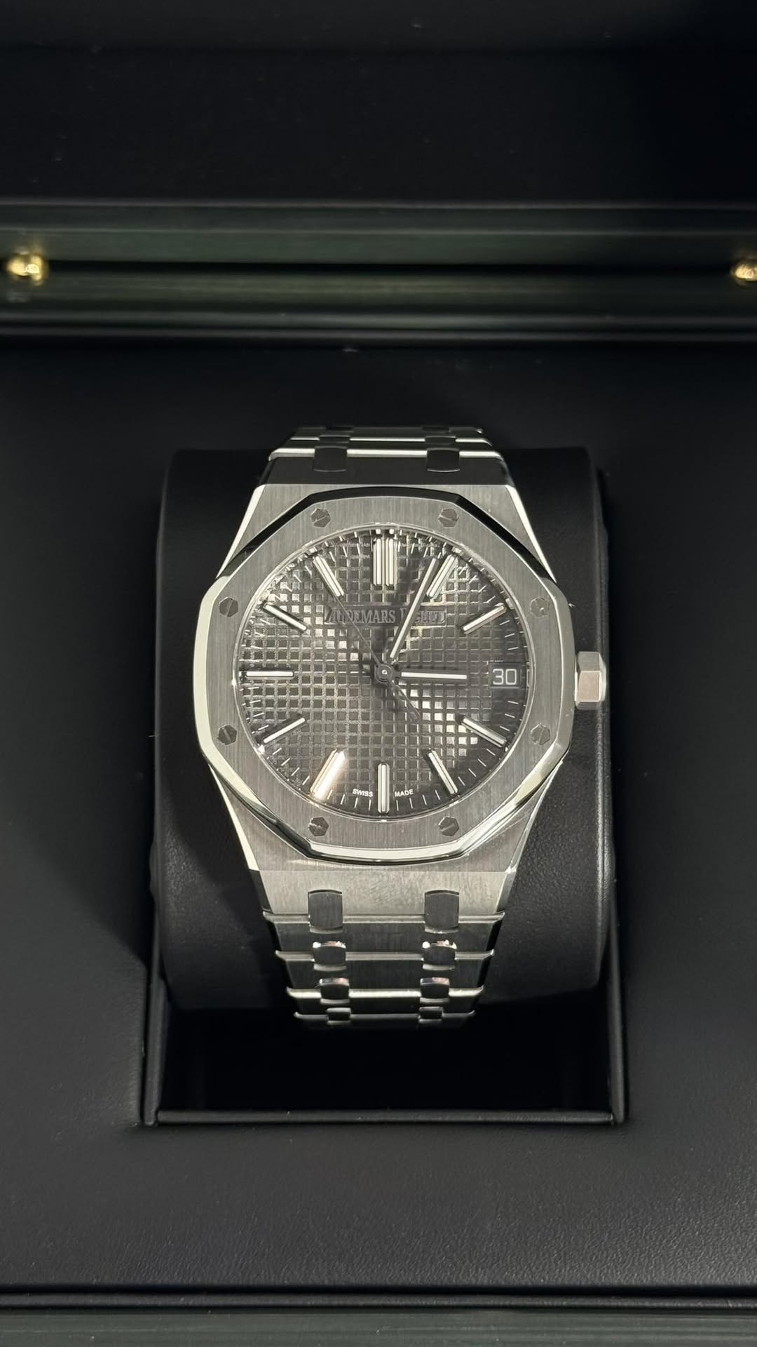 May be an image of wrist watch and text