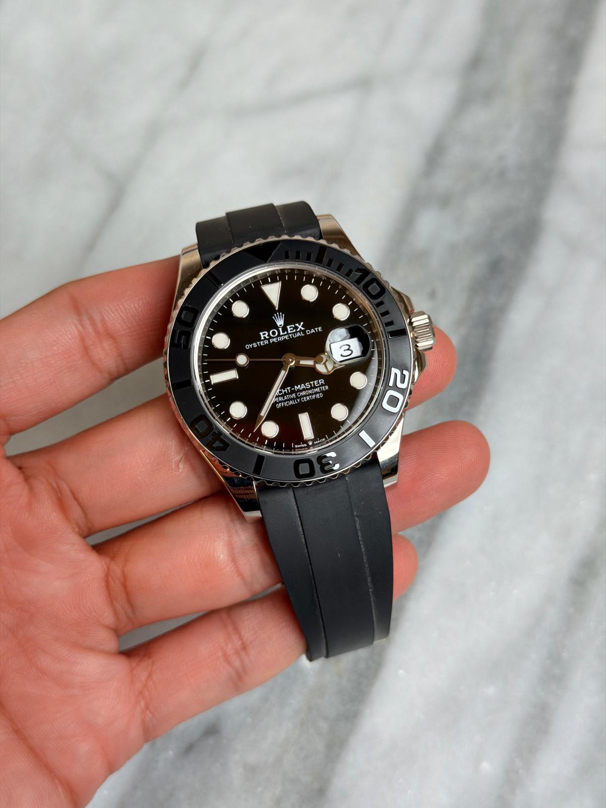 May be an image of wrist watch and text
