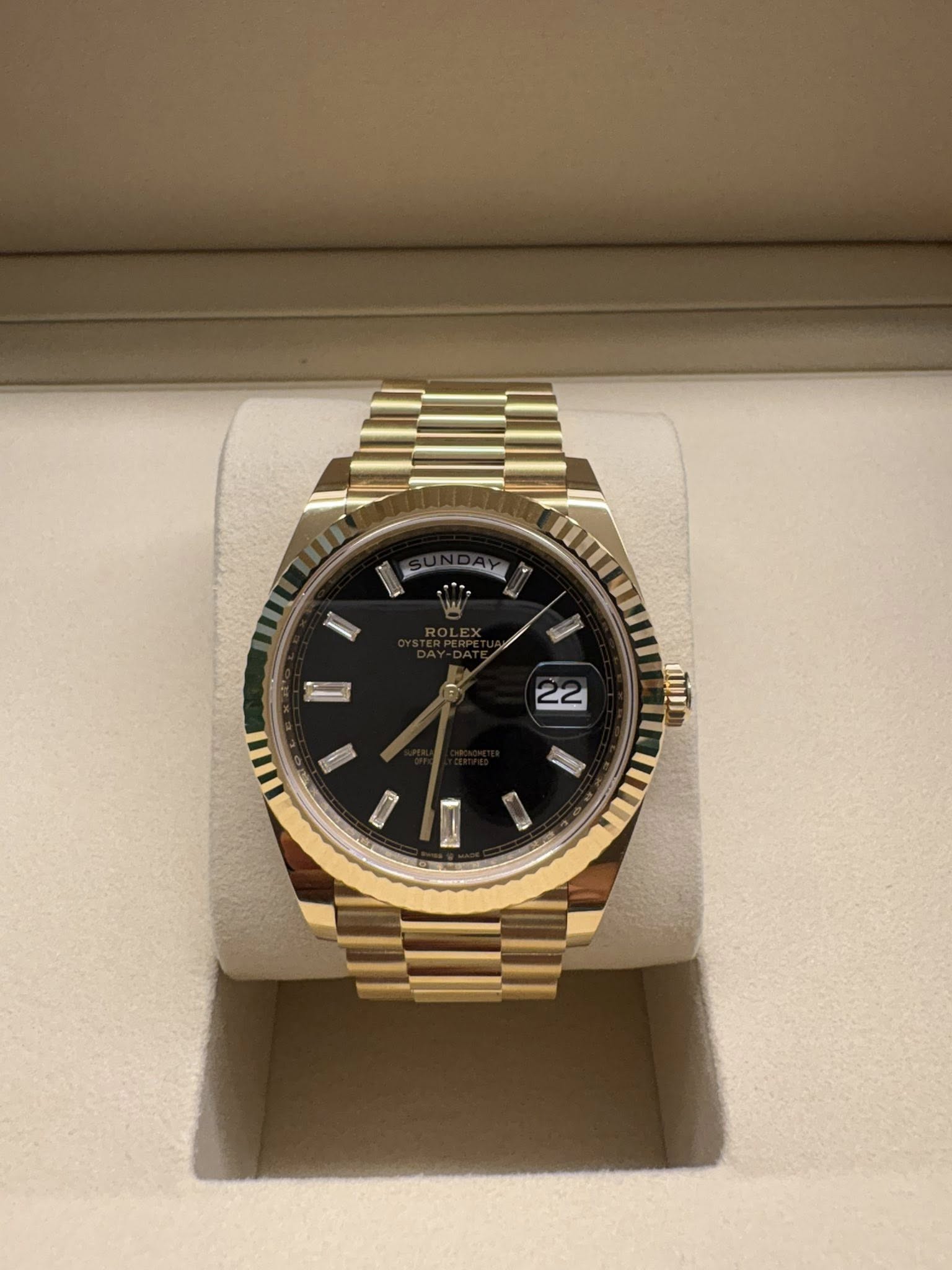 May be an image of wrist watch and text