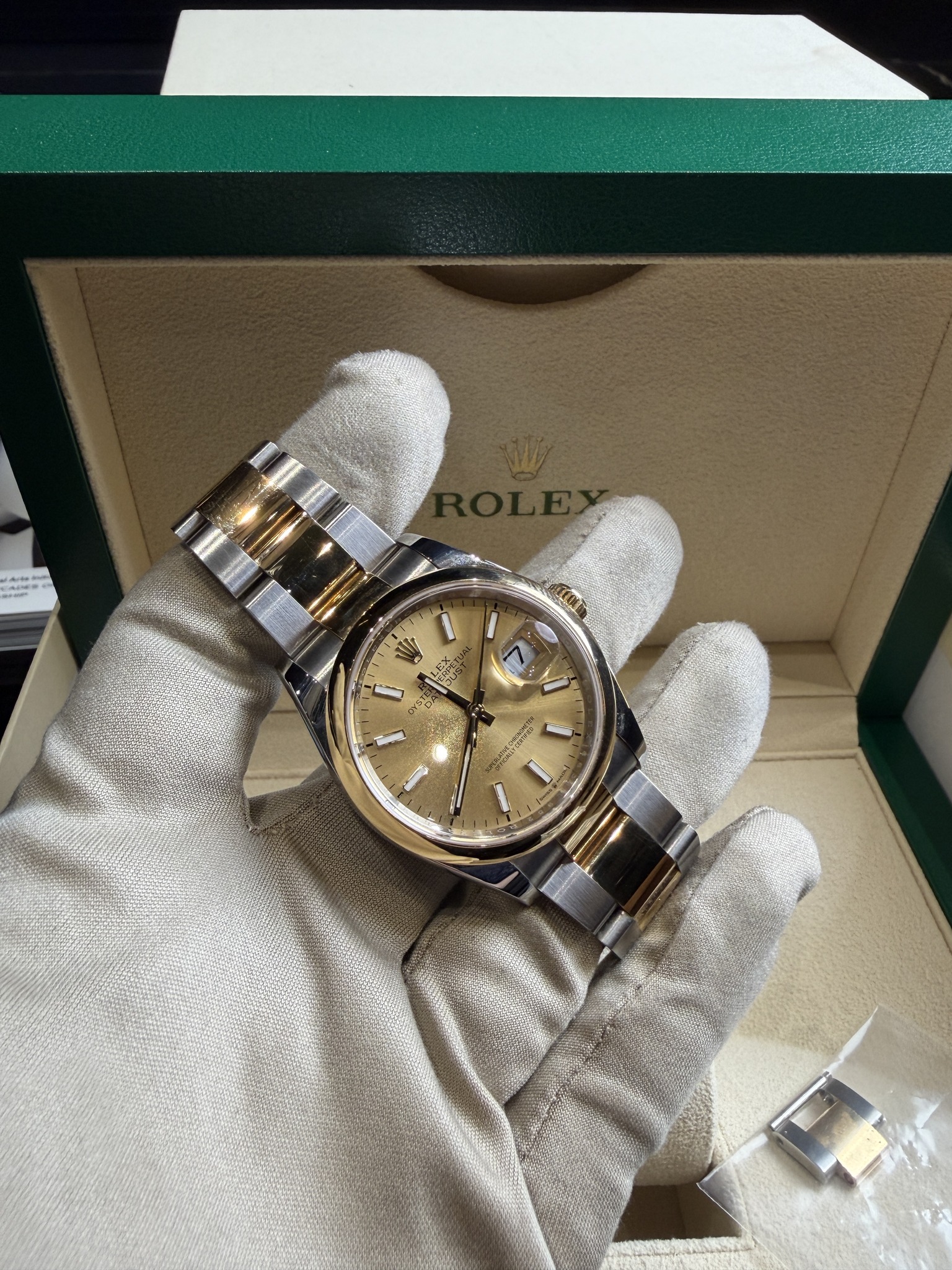 May be an image of wrist watch and text