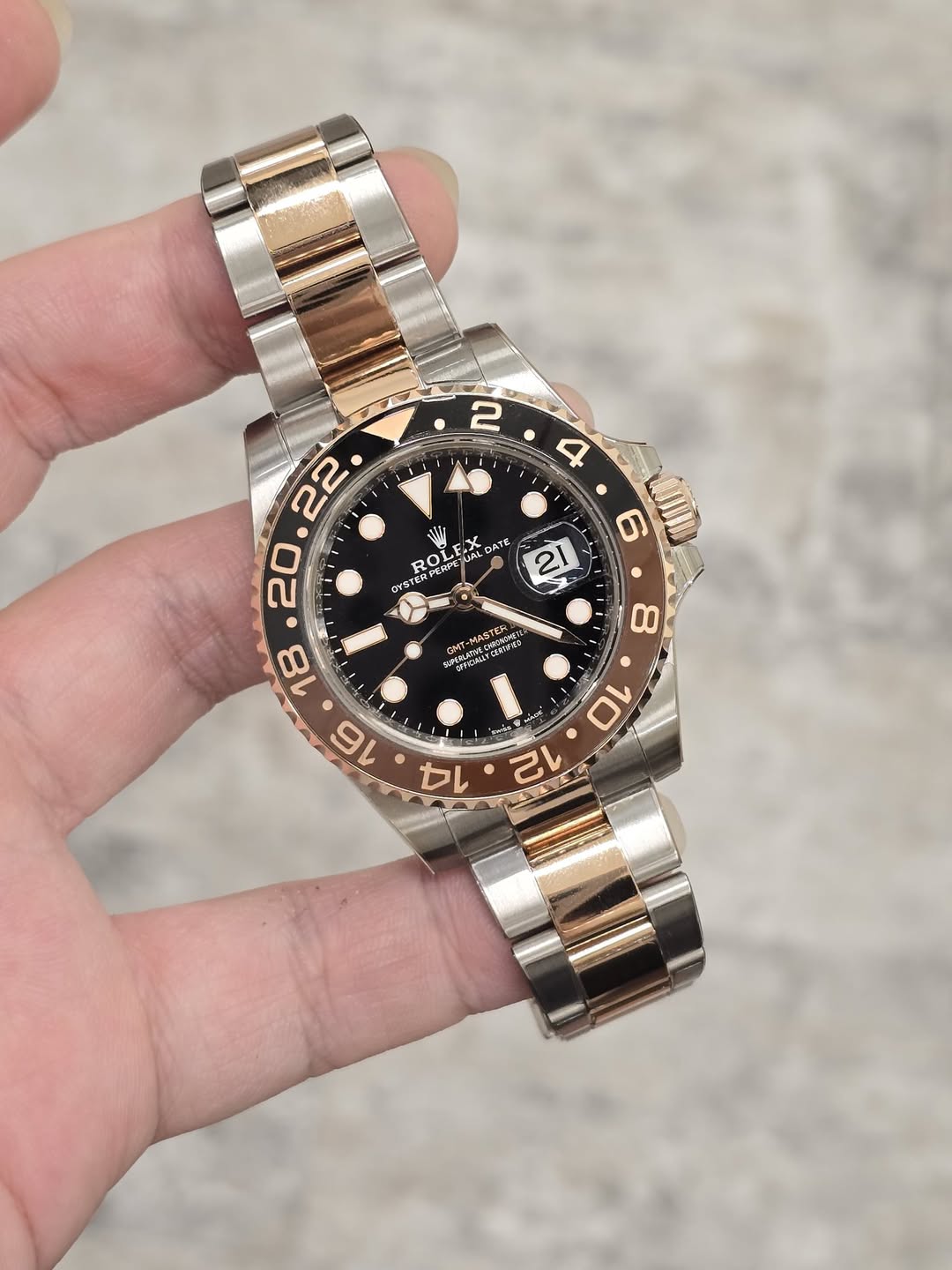 May be an image of wrist watch and text