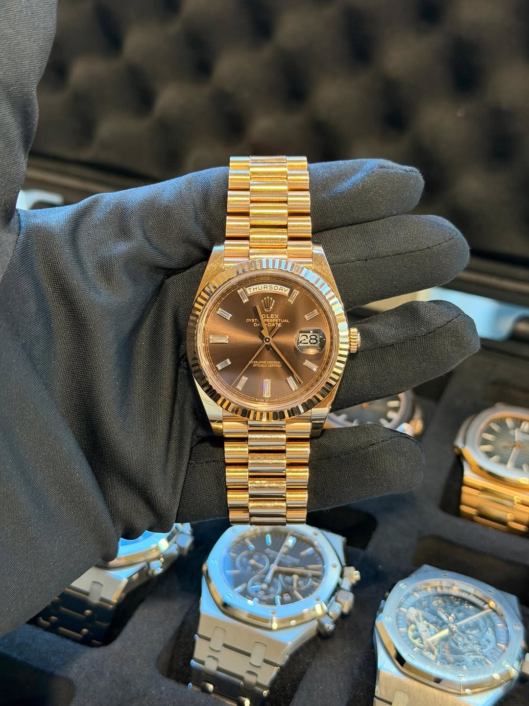 May be an image of wrist watch and text