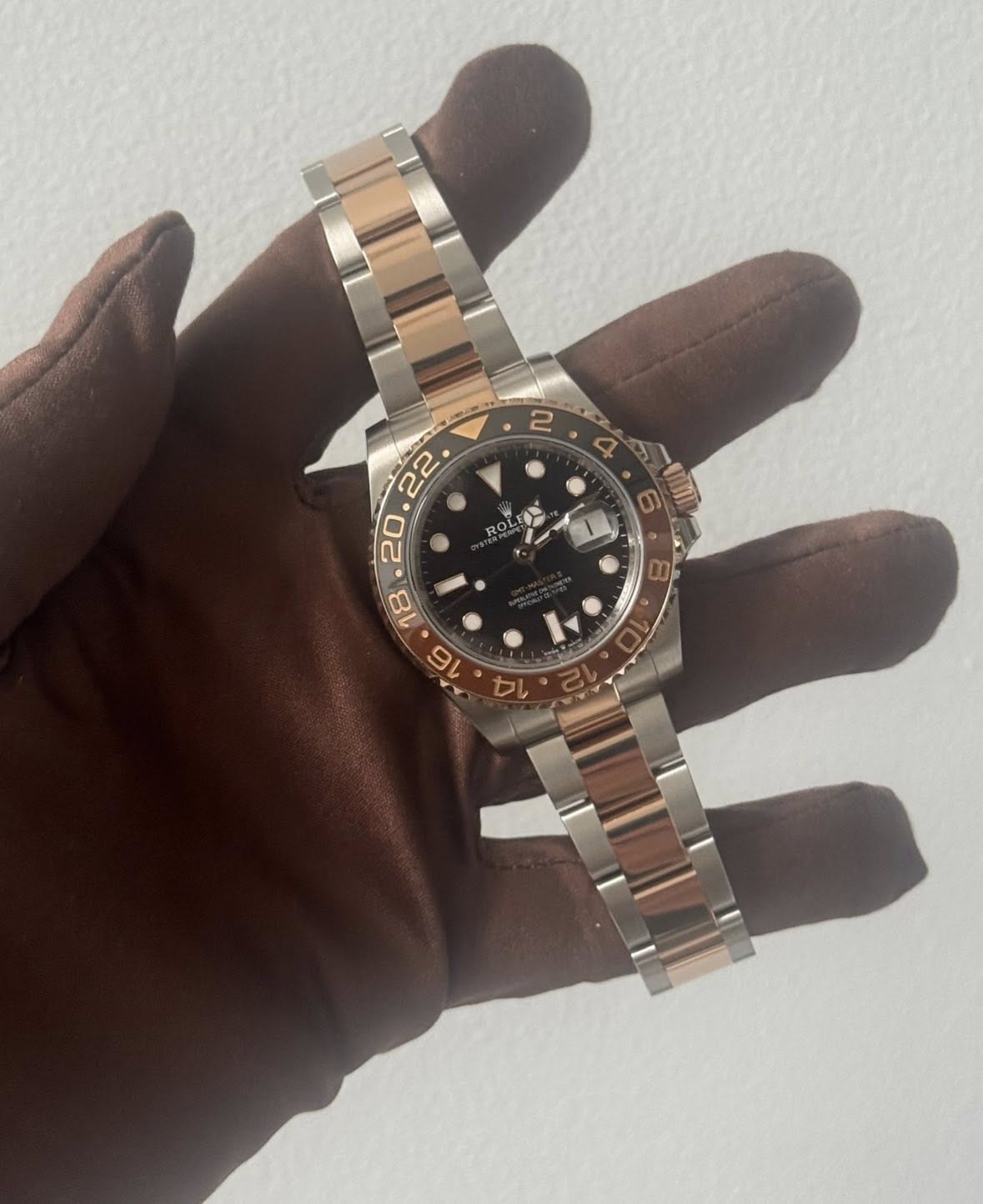 May be an image of wrist watch and text