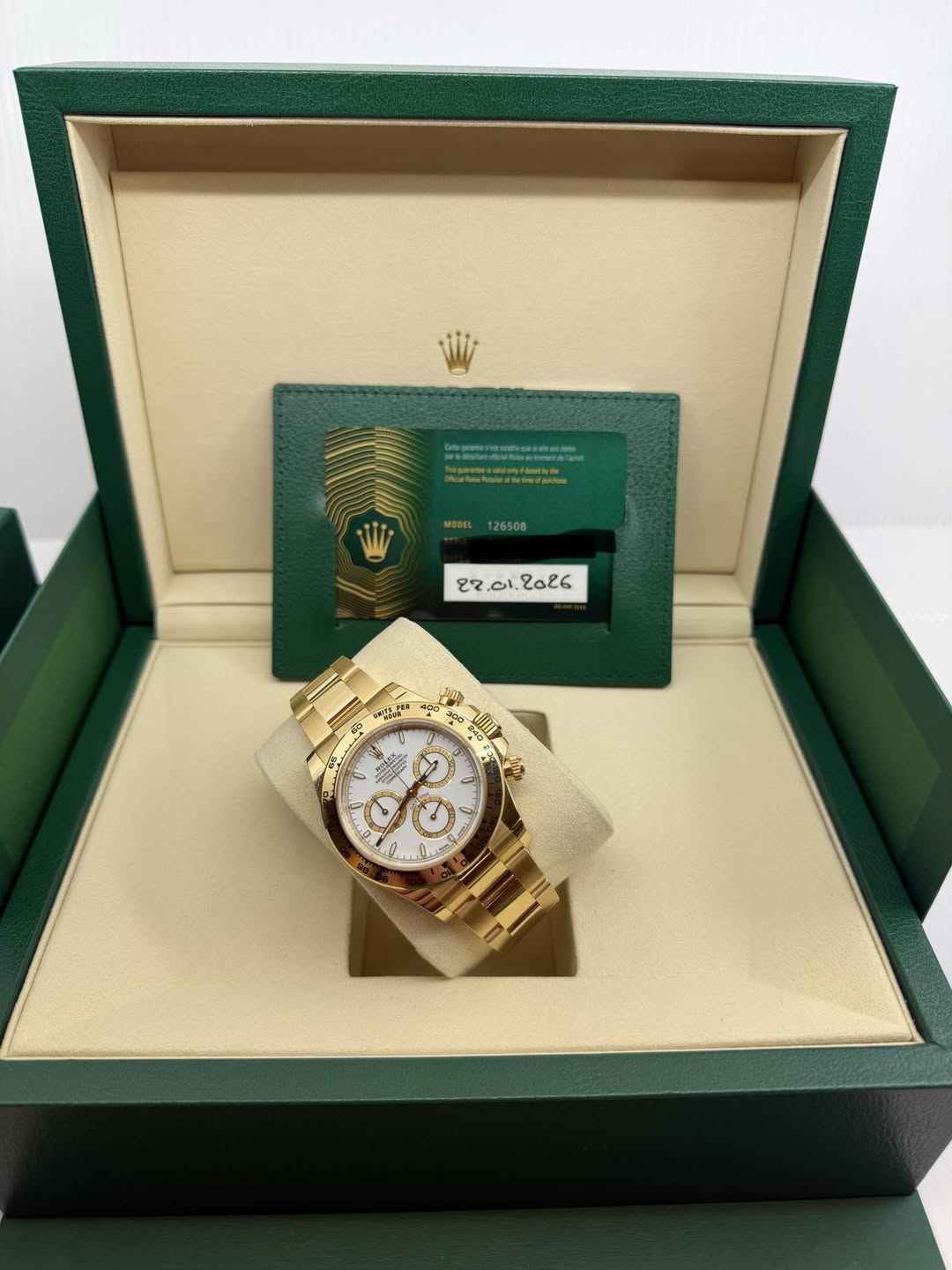 May be an image of wrist watch and text