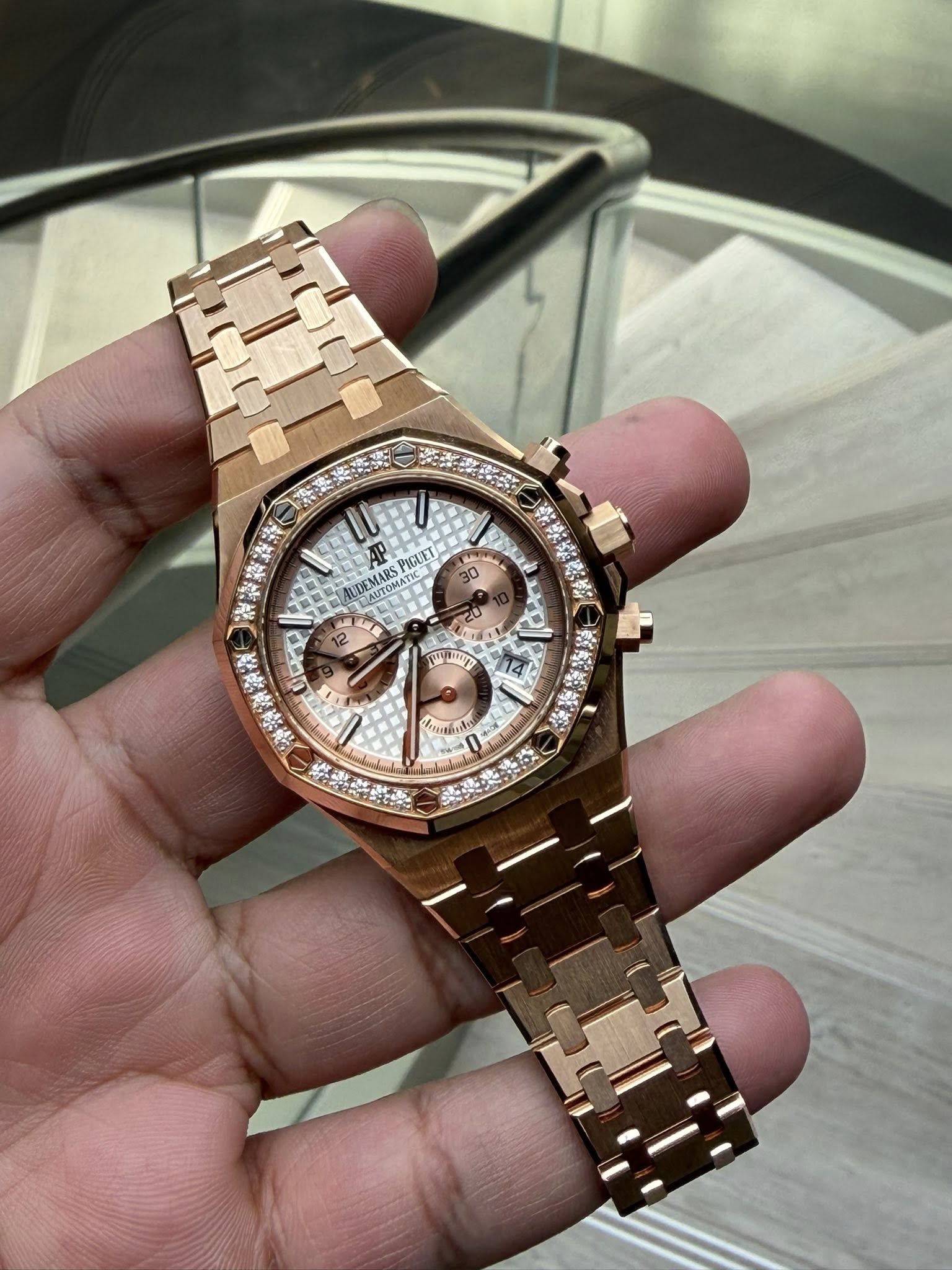 May be an image of wrist watch and text