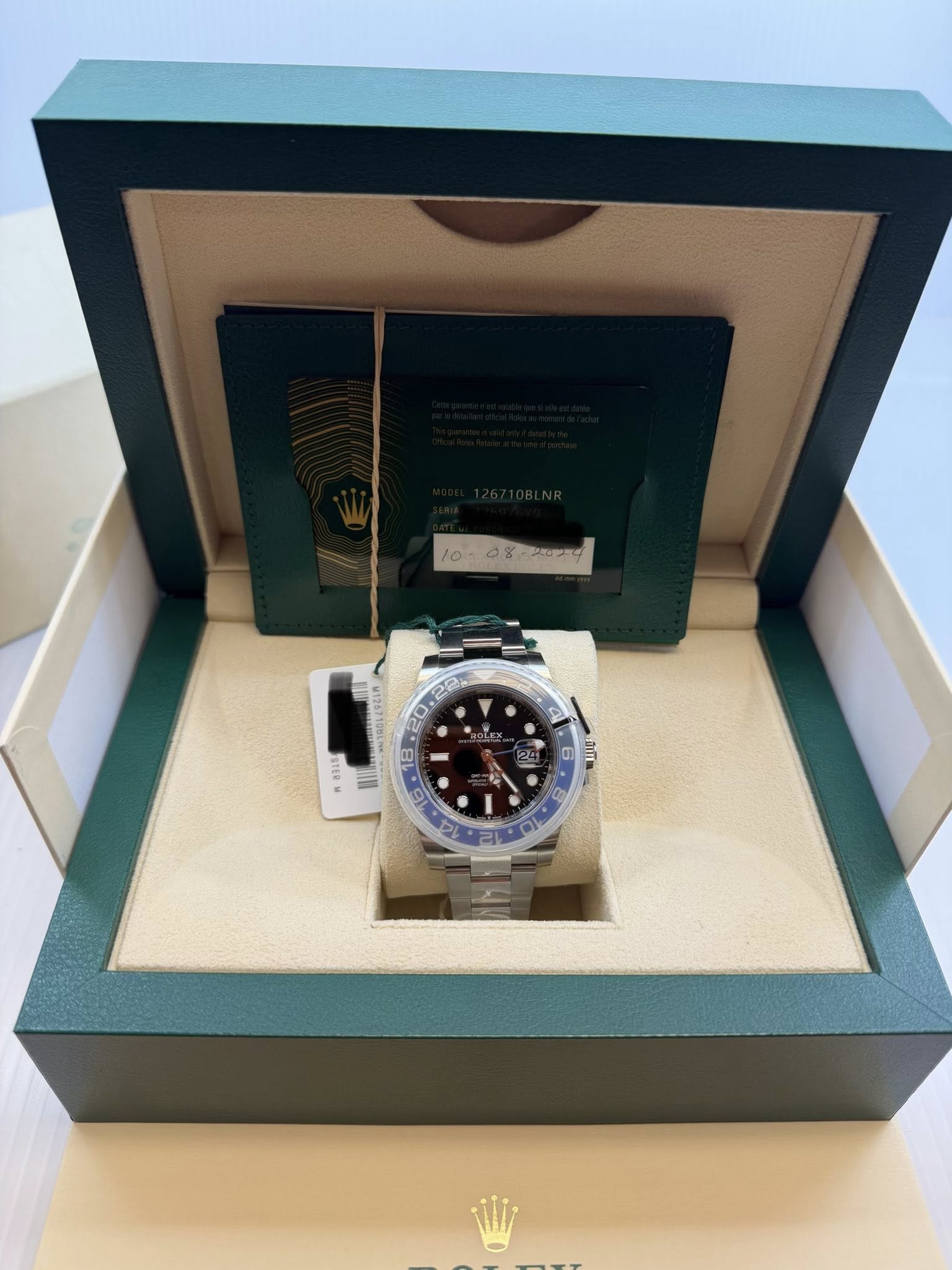 May be an image of wrist watch and text