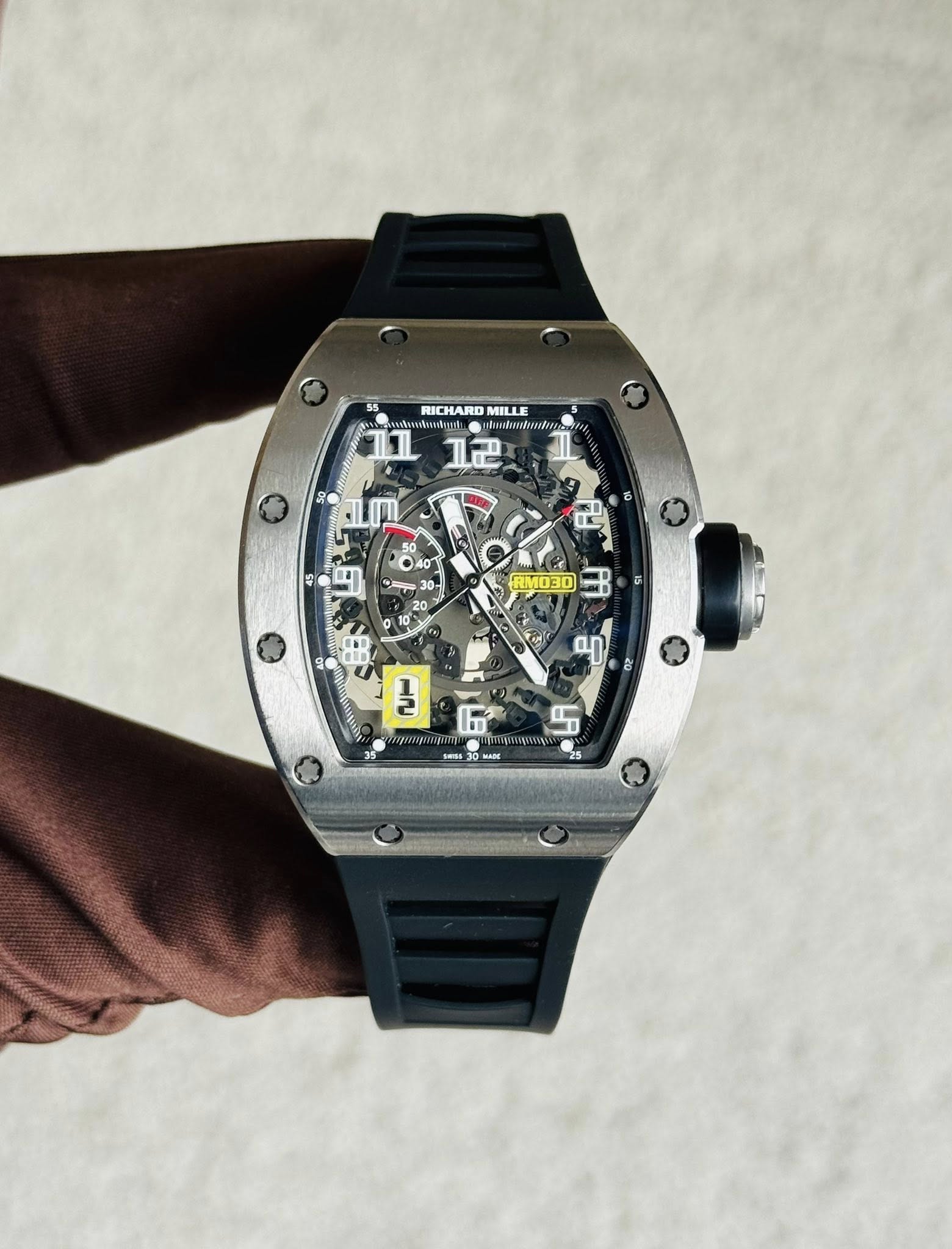 May be an image of wrist watch and text