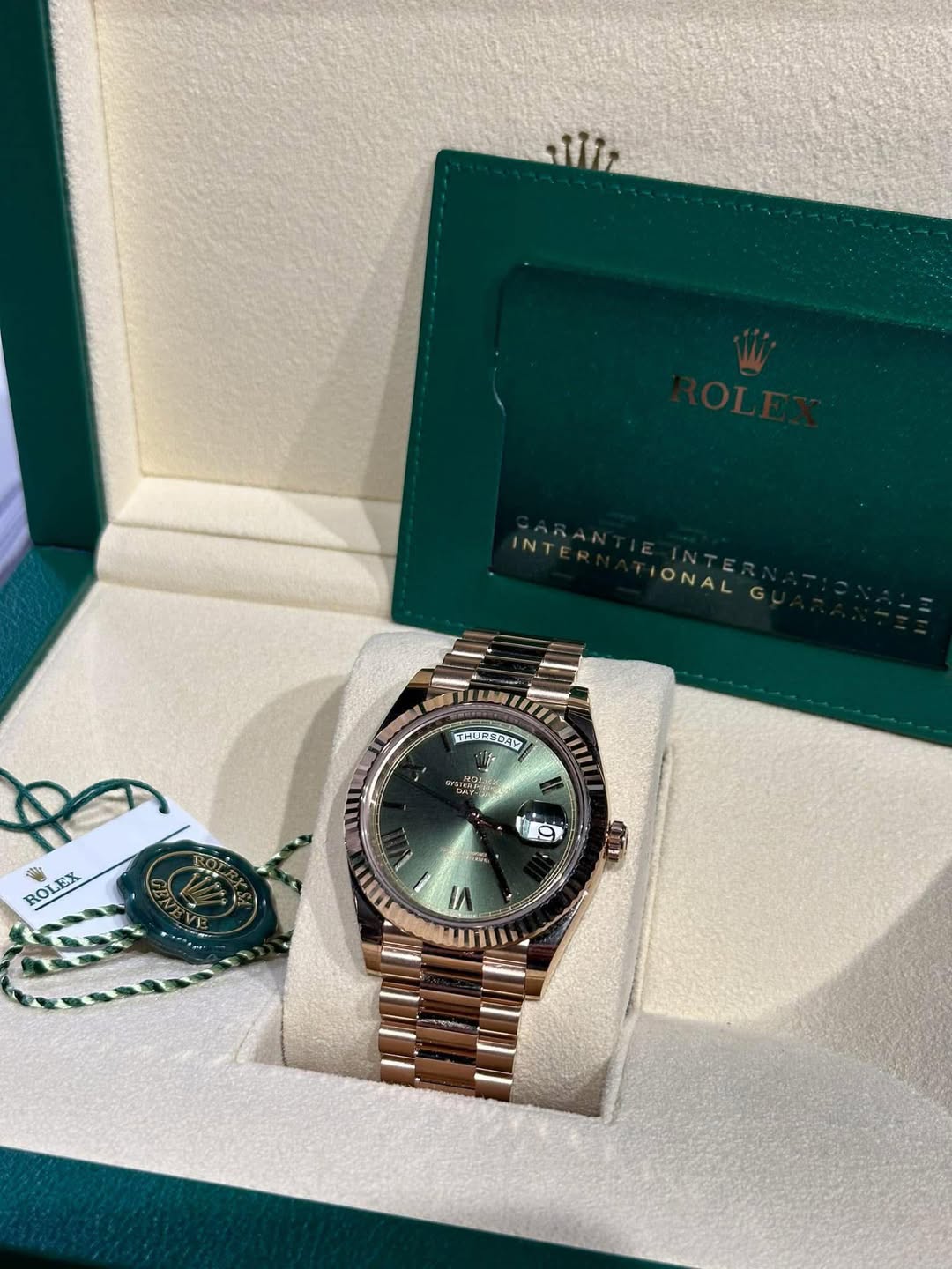 May be an image of wrist watch and text