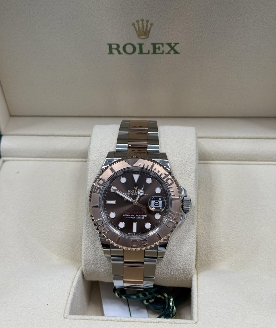 May be an image of wrist watch and text