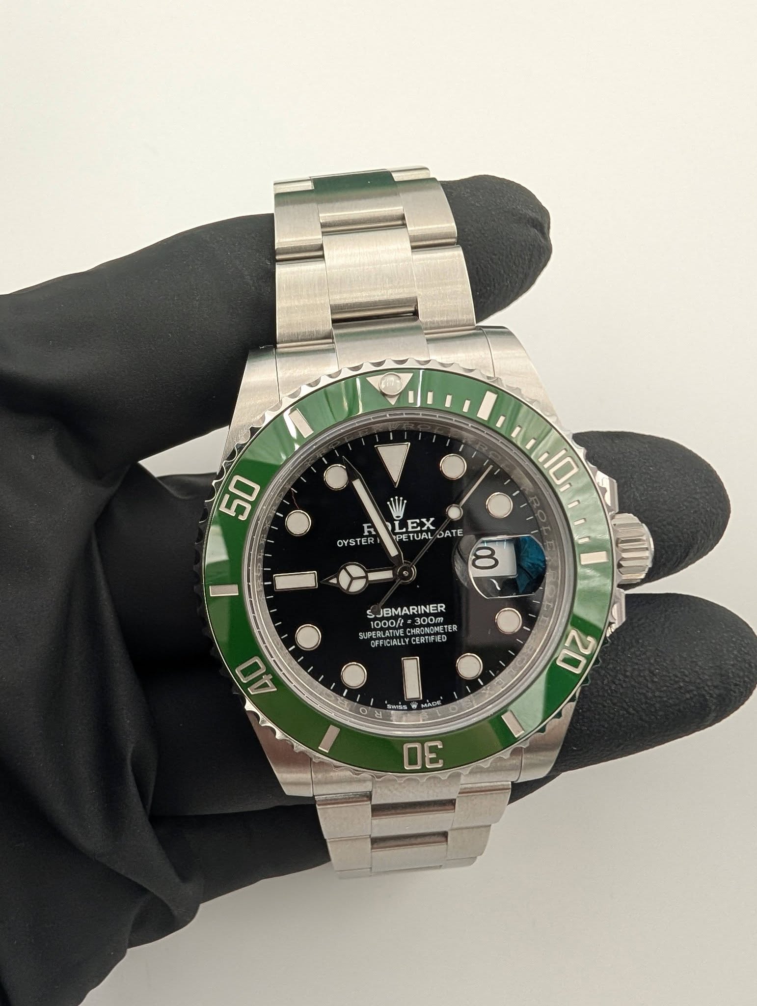 May be an image of wrist watch and text that says '50 O F OYSTER LEX ነትር TUA UAL ATE 10 8 SJBMARINER SUPERLATINE E 1000l 1000R 300 SOMONFTER CHOMETE OFFICIALLYCE OFFICIA…
