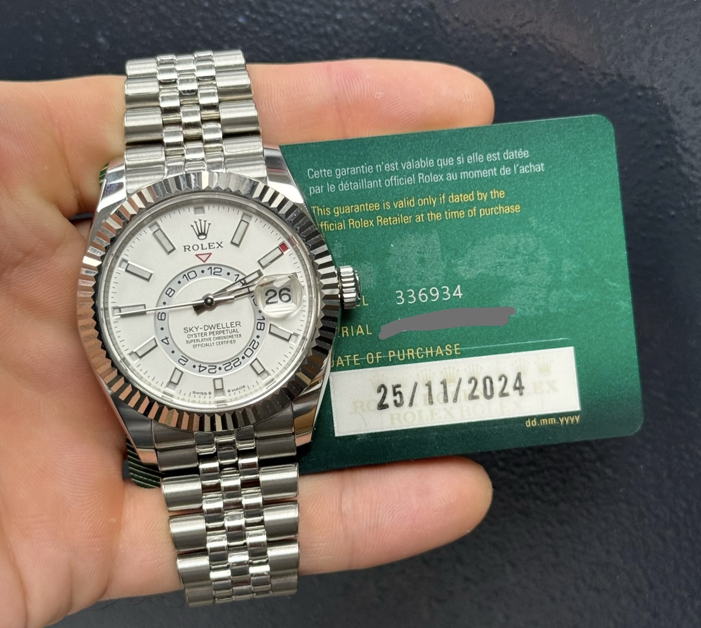 May be an image of wrist watch and text that says 'IIMTO WI RO ROLEX EX Cette garantie n'est valable que elle est datée par détaillant officiel Rolexa moment de| achat the This…