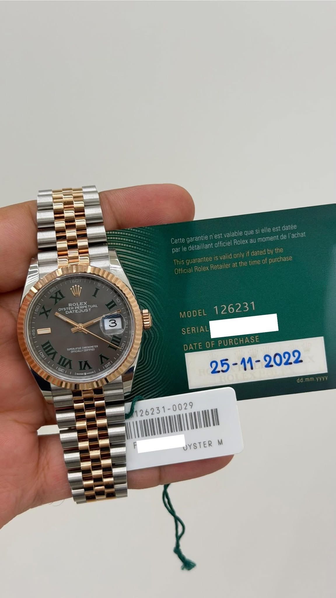 May be an image of wrist watch and text