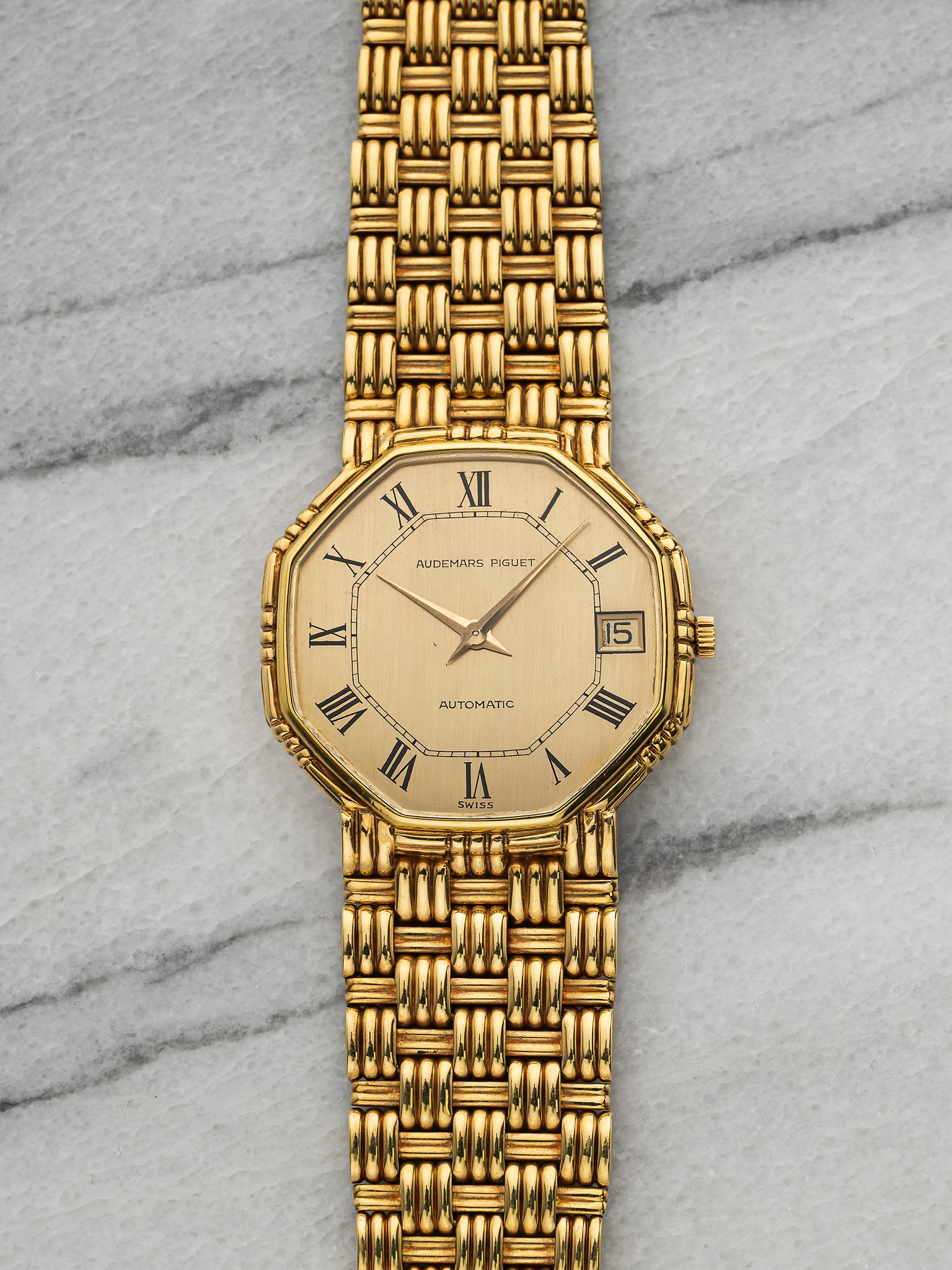 May be an image of wrist watch and text that says '!!! XI XII I AUDEMANS PIGUET 15 TAI VII AUTOMATIC VII I SWISS Mm ROC'