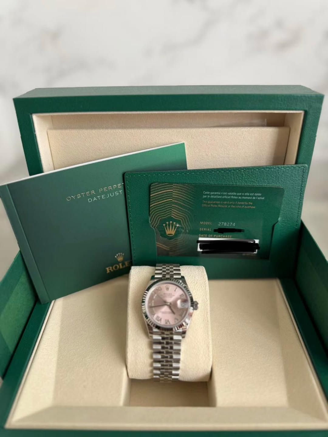 May be an image of wrist watch and text that says 'OYSTER OYSTERPERPE DATE UST PERPE DATEJUST ር 탄 י00מי பக N'