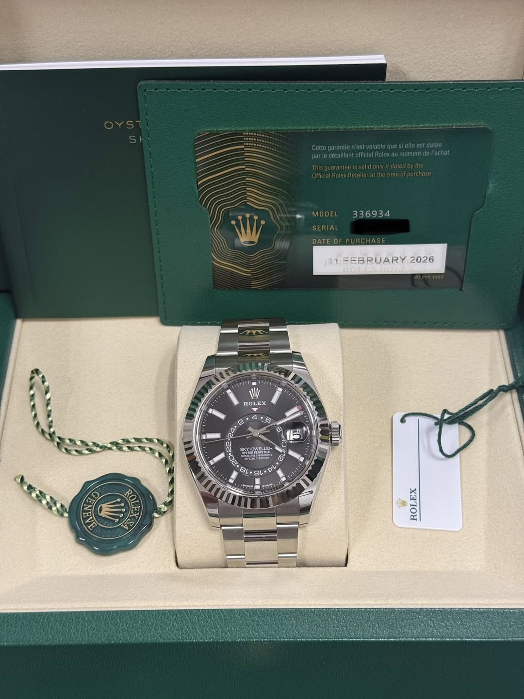 May be an image of wrist watch and text that says 'MODEL336934 MODEL 336934 SERIAL DATE 11FEBRUARY 2026 PP ا D W ROLEX OL + : *5 S 15 عبه MLLC TTBTIS いー م RUL 監 老 ES ROLEX'